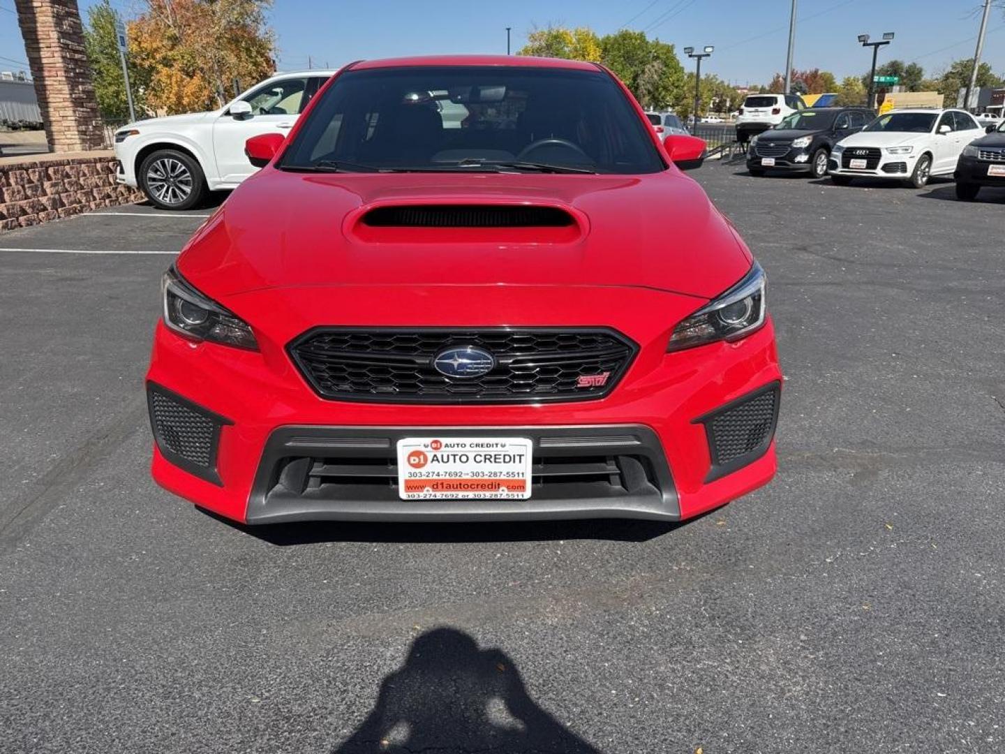 2019 Pure Red /Black/Carbon Black Subaru WRX STi (JF1VA2S64K9) with an 2.5L DOHC Intercooled High Boost Turbocharged engine, Manual transmission, located at 8595 Washington St., Thornton, CO, 80229, (303) 287-5511, 39.852348, -104.978447 - 2019 Subaru WRX STI with low miles and in excellent condition insdie and out!<br>All Cars Have Clean Titles And Are Serviced Before Sale.Apple/Android Car Play, Blind Spot Monitoring, Backup Camera, Leather, Heated Seats, Bluetooth/ With Bluetooth Audio, Non Smoker, No Pet Odor Or Hair, WRX STi, Clo - Photo#1