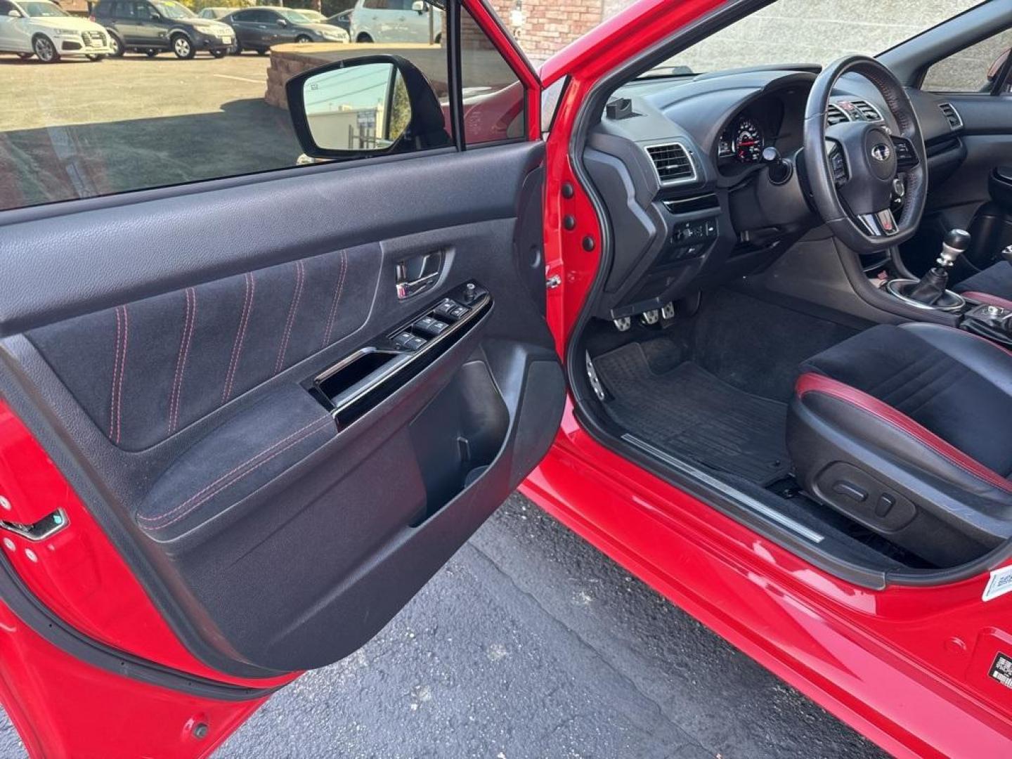 2019 Pure Red /Black/Carbon Black Subaru WRX STi (JF1VA2S64K9) with an 2.5L DOHC Intercooled High Boost Turbocharged engine, Manual transmission, located at 8595 Washington St., Thornton, CO, 80229, (303) 287-5511, 39.852348, -104.978447 - 2019 Subaru WRX STI with low miles and in excellent condition insdie and out!<br>All Cars Have Clean Titles And Are Serviced Before Sale.Apple/Android Car Play, Blind Spot Monitoring, Backup Camera, Leather, Heated Seats, Bluetooth/ With Bluetooth Audio, Non Smoker, No Pet Odor Or Hair, WRX STi, Clo - Photo#32