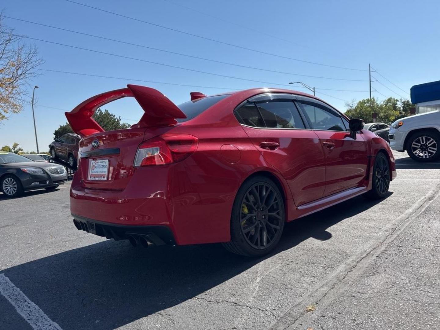 2019 Pure Red /Black/Carbon Black Subaru WRX STi (JF1VA2S64K9) with an 2.5L DOHC Intercooled High Boost Turbocharged engine, Manual transmission, located at 8595 Washington St., Thornton, CO, 80229, (303) 287-5511, 39.852348, -104.978447 - 2019 Subaru WRX STI with low miles and in excellent condition insdie and out!<br>All Cars Have Clean Titles And Are Serviced Before Sale.Apple/Android Car Play, Blind Spot Monitoring, Backup Camera, Leather, Heated Seats, Bluetooth/ With Bluetooth Audio, Non Smoker, No Pet Odor Or Hair, WRX STi, Clo - Photo#5