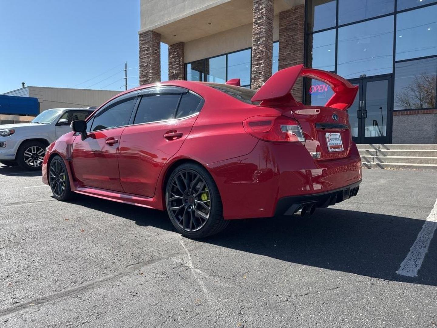 2019 Pure Red /Black/Carbon Black Subaru WRX STi (JF1VA2S64K9) with an 2.5L DOHC Intercooled High Boost Turbocharged engine, Manual transmission, located at 8595 Washington St., Thornton, CO, 80229, (303) 287-5511, 39.852348, -104.978447 - 2019 Subaru WRX STI with low miles and in excellent condition insdie and out!<br>All Cars Have Clean Titles And Are Serviced Before Sale.Apple/Android Car Play, Blind Spot Monitoring, Backup Camera, Leather, Heated Seats, Bluetooth/ With Bluetooth Audio, Non Smoker, No Pet Odor Or Hair, WRX STi, Clo - Photo#7