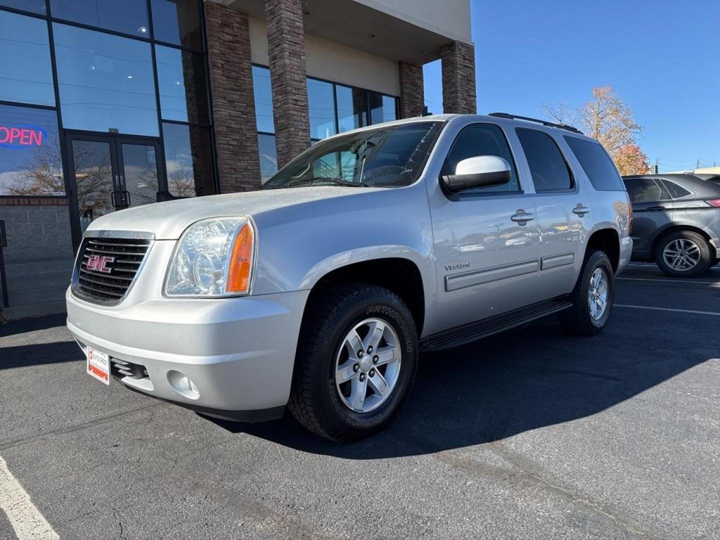 2013 Quicksilver Metallic /Ebony GMC Yukon SLT (1GKS2CE00DR) with an Vortec 5.3L V8 SFI Flex Fuel engine, Automatic transmission, located at 8595 Washington St., Thornton, CO, 80229, (303) 287-5511, 39.852348, -104.978447 - 2013 GMC Yukon, Fully serviced with low miles. Heated leather seats, 3rd row seating, backup camera, Bluetooth and more. All common oil leaking lines have been replaced. Zero leaks and runs like a top! <br><br>All Cars Have Clean Titles And Are Serviced Before Sale., Backup Camera, Leather, Heated S - Photo#0