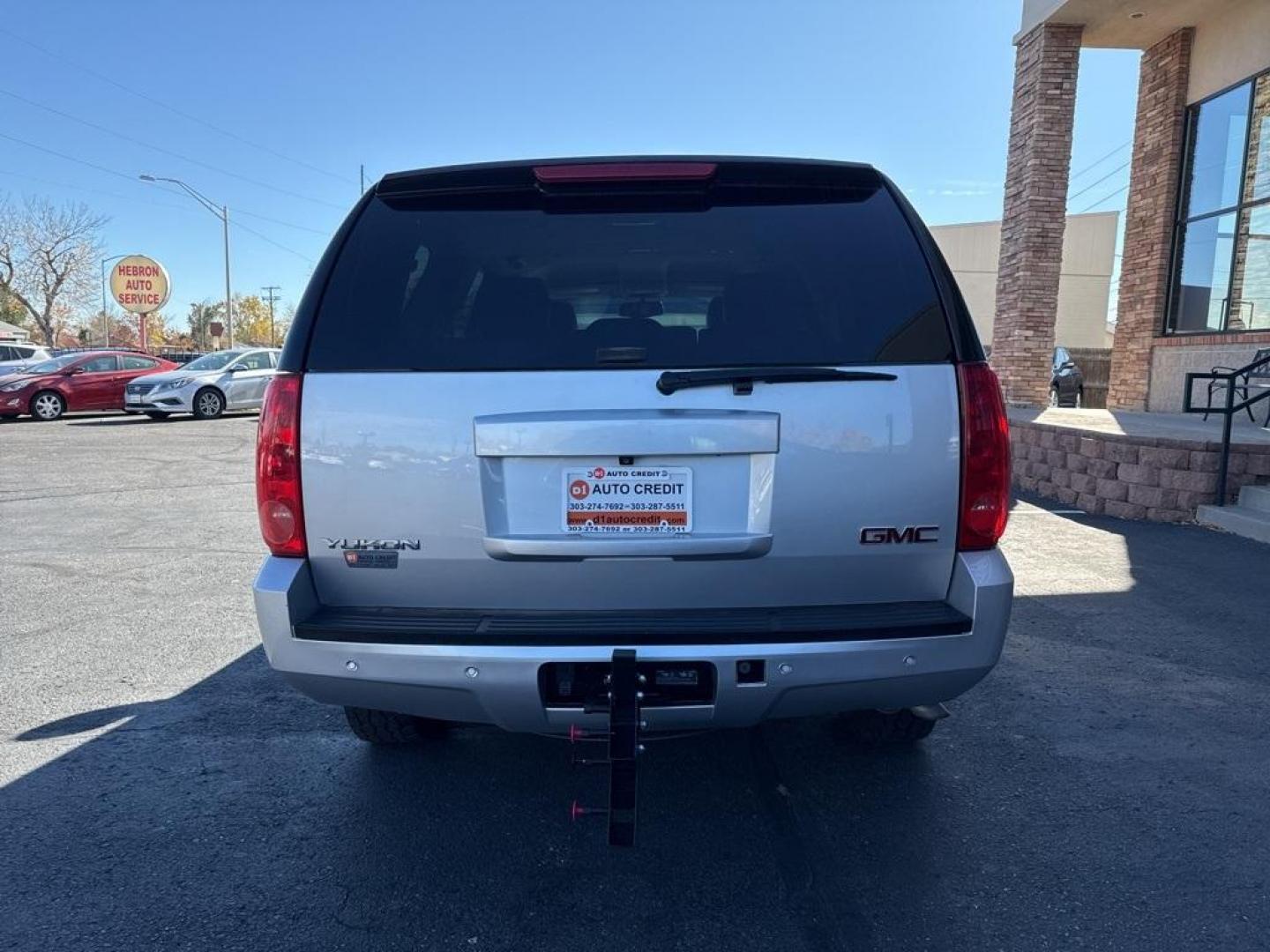 2013 Quicksilver Metallic /Ebony GMC Yukon SLT (1GKS2CE00DR) with an Vortec 5.3L V8 SFI Flex Fuel engine, Automatic transmission, located at 8595 Washington St., Thornton, CO, 80229, (303) 287-5511, 39.852348, -104.978447 - 2013 GMC Yukon, Fully serviced with low miles. Heated leather seats, 3rd row seating, backup camera, Bluetooth and more. All common oil leaking lines have been replaced. Zero leaks and runs like a top! <br><br>All Cars Have Clean Titles And Are Serviced Before Sale., Backup Camera, Leather, Heated S - Photo#5