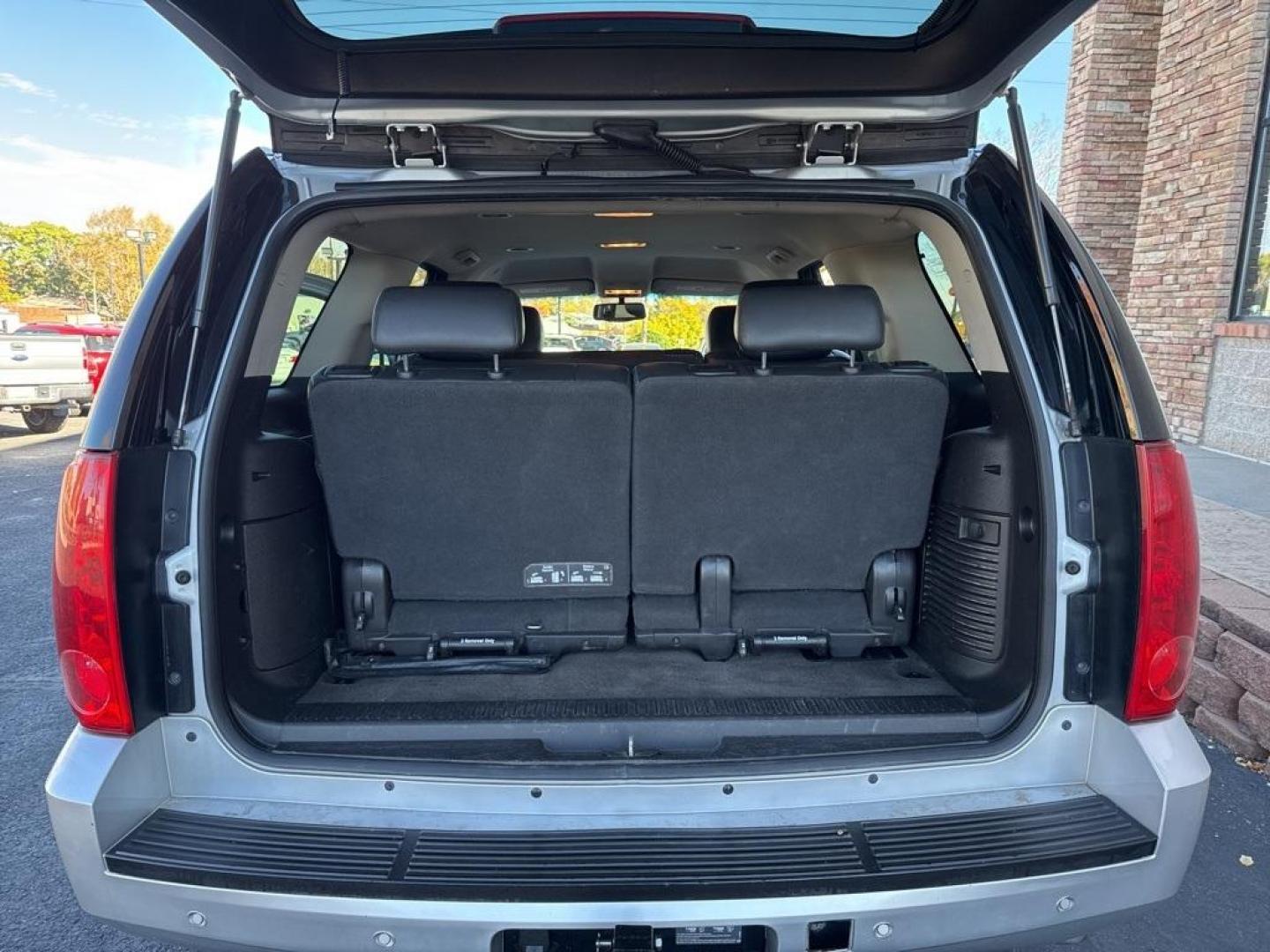 2013 Quicksilver Metallic /Ebony GMC Yukon SLT (1GKS2CE00DR) with an Vortec 5.3L V8 SFI Flex Fuel engine, Automatic transmission, located at 8595 Washington St., Thornton, CO, 80229, (303) 287-5511, 39.852348, -104.978447 - 2013 GMC Yukon, Fully serviced with low miles. Heated leather seats, 3rd row seating, backup camera, Bluetooth and more. All common oil leaking lines have been replaced. Zero leaks and runs like a top! <br><br>All Cars Have Clean Titles And Are Serviced Before Sale., Backup Camera, Leather, Heated S - Photo#17