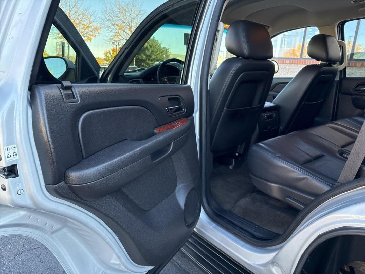 2013 Quicksilver Metallic /Ebony GMC Yukon SLT (1GKS2CE00DR) with an Vortec 5.3L V8 SFI Flex Fuel engine, Automatic transmission, located at 8595 Washington St., Thornton, CO, 80229, (303) 287-5511, 39.852348, -104.978447 - 2013 GMC Yukon, Fully serviced with low miles. Heated leather seats, 3rd row seating, backup camera, Bluetooth and more. All common oil leaking lines have been replaced. Zero leaks and runs like a top! <br><br>All Cars Have Clean Titles And Are Serviced Before Sale., Backup Camera, Leather, Heated S - Photo#26