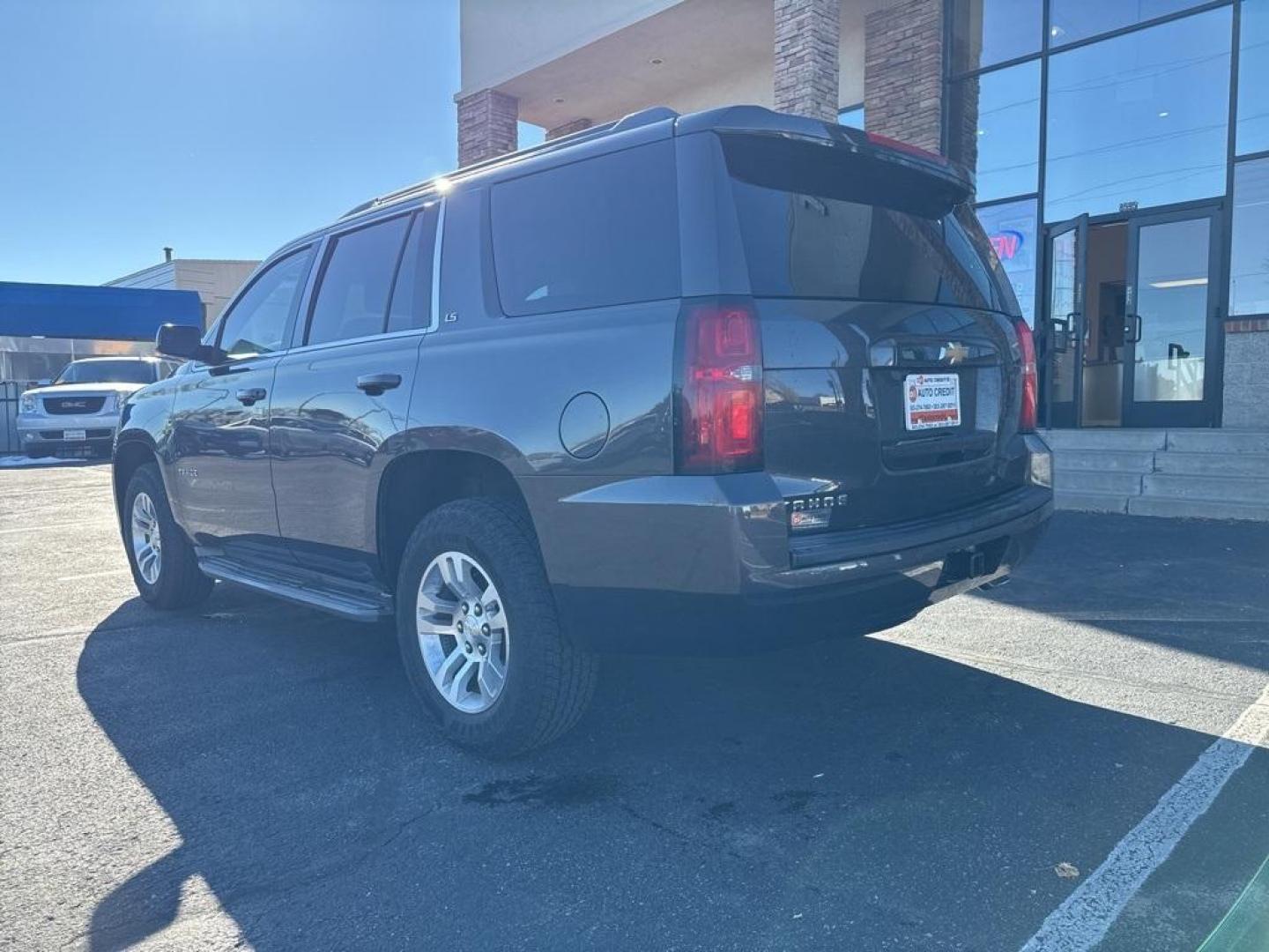 2015 Tungsten Metallic /Black Chevrolet Tahoe LS (1GNSKAKC6FR) with an EcoTec3 5.3L V8 Flex Fuel engine, Automatic transmission, located at 8595 Washington St., Thornton, CO, 80229, (303) 287-5511, 39.852348, -104.978447 - 2015 Chevrolet Tahoe 4WD 4WD, Black Cloth.<br><br>D1 Auto NEVER charges dealer fees! All cars have clean titles and have been inspected for mechanical issues. We have financing for everyone. Good credit, bad credit, first time buyers.<br>Odometer is 8713 miles below market average!<br>Please call La - Photo#6