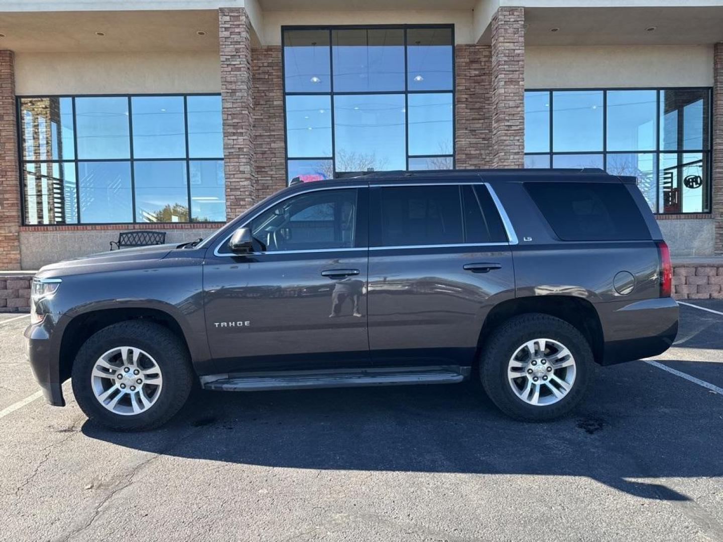 2015 Tungsten Metallic /Black Chevrolet Tahoe LS (1GNSKAKC6FR) with an EcoTec3 5.3L V8 Flex Fuel engine, Automatic transmission, located at 8595 Washington St., Thornton, CO, 80229, (303) 287-5511, 39.852348, -104.978447 - 2015 Chevrolet Tahoe 4WD 4WD, Black Cloth.<br><br>D1 Auto NEVER charges dealer fees! All cars have clean titles and have been inspected for mechanical issues. We have financing for everyone. Good credit, bad credit, first time buyers.<br>Odometer is 8713 miles below market average!<br>Please call La - Photo#7