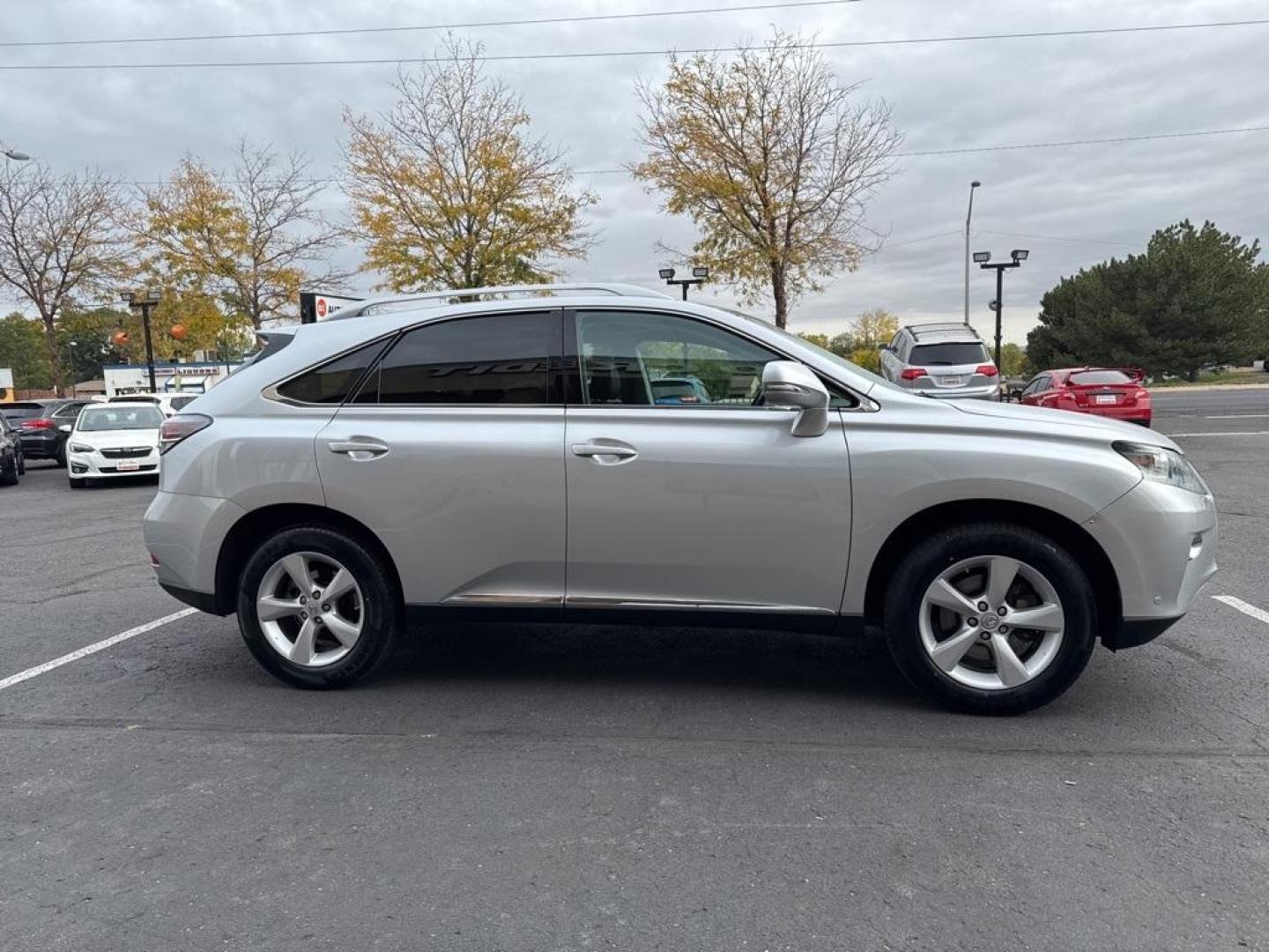 2015 Silver Lining Metallic /Black Lexus RX 350 (2T2BK1BAXFC) with an 3.5L V6 DOHC Dual VVT-i 24V engine, Automatic transmission, located at 8595 Washington St., Thornton, CO, 80229, (303) 287-5511, 39.852348, -104.978447 - 2015 Lexus RX 350 fully serviced including new tires. Clean Carfax and loaded with, heated and cooled seats, blindspot monitoring, backup camera, Bluetooth, sun roof and much more. This car has no signs of ever having pets or a smoker in it. <br>All Cars Have Clean Titles And Are Serviced Before Sal - Photo#1