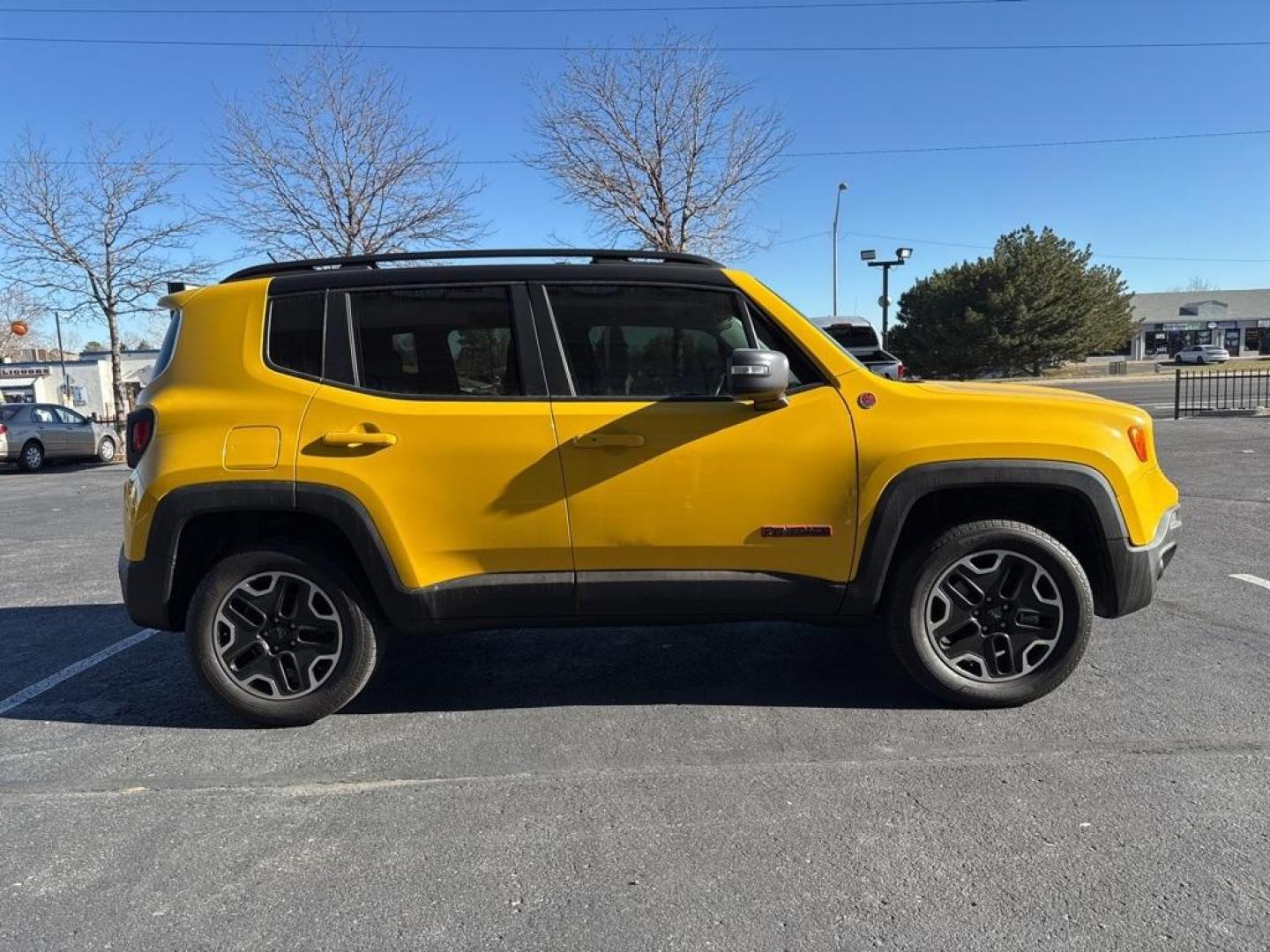 2016 Solar Yellow /Black Jeep Renegade Trailhawk (ZACCJBCT1GP) with an 2.4L I4 MultiAir engine, Automatic transmission, located at 8595 Washington St., Thornton, CO, 80229, (303) 287-5511, 39.852348, -104.978447 - 2016 Jeep Renegade 4WD <br><br>All Cars Have Clean Titles And Are Serviced Before Sale., <br><br>Loaded with, Blind Spot Monitoring, Backup Camera, Leather, Heated Seats, Bluetooth/ With Bluetooth Audio, Non Smoker, No Pet Odor Or Hair, Beats Audio, Renegade Trailhawk, 4WD, My Sky Power/Removable Su - Photo#3