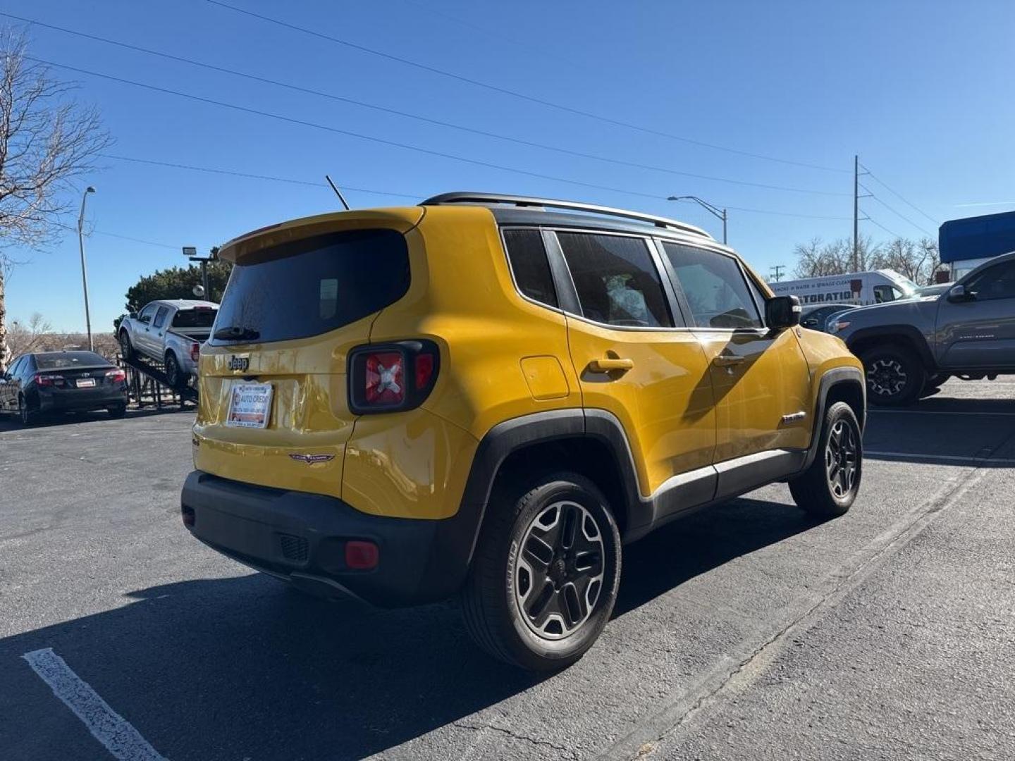 2016 Solar Yellow /Black Jeep Renegade Trailhawk (ZACCJBCT1GP) with an 2.4L I4 MultiAir engine, Automatic transmission, located at 8595 Washington St., Thornton, CO, 80229, (303) 287-5511, 39.852348, -104.978447 - 2016 Jeep Renegade 4WD <br><br>All Cars Have Clean Titles And Are Serviced Before Sale., <br><br>Loaded with, Blind Spot Monitoring, Backup Camera, Leather, Heated Seats, Bluetooth/ With Bluetooth Audio, Non Smoker, No Pet Odor Or Hair, Beats Audio, Renegade Trailhawk, 4WD, My Sky Power/Removable Su - Photo#4