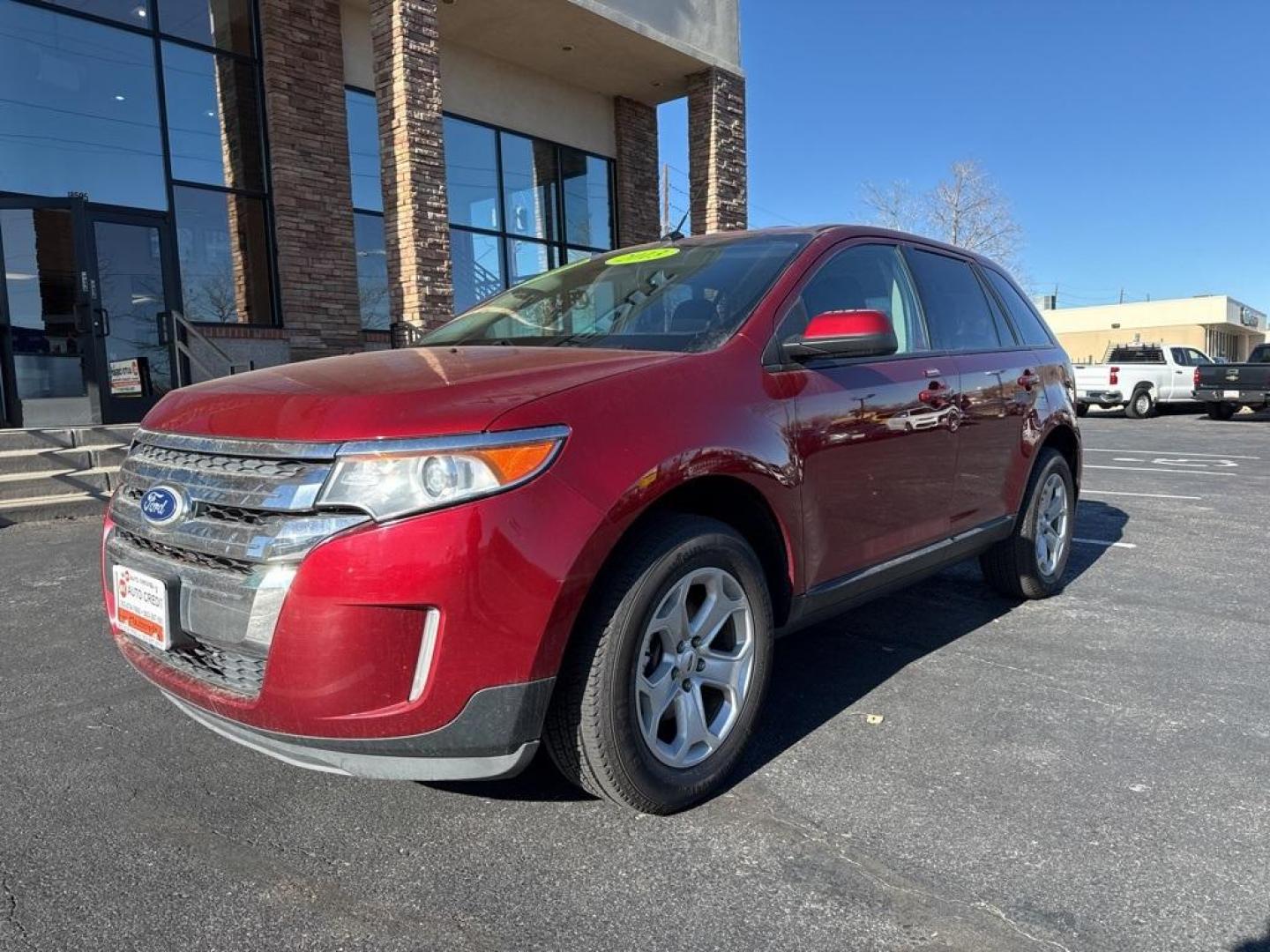 2013 Ruby Red Metallic /Charcoal Black Ford Edge SEL (2FMDK4JC7DB) with an 3.5L V6 Ti-VCT engine, Automatic transmission, located at 8595 Washington St., Thornton, CO, 80229, (303) 287-5511, 39.852348, -104.978447 - 2013 Ford Edge CARFAX One-Owner. AWD AWD.<br><br>D1 Auto NEVER charges dealer fees! All cars have clean titles and have been inspected for mechanical issues. We have financing for everyone. Good credit, bad credit, first time buyers.<br>Odometer is 19551 miles below market average!<br>Please call La - Photo#0