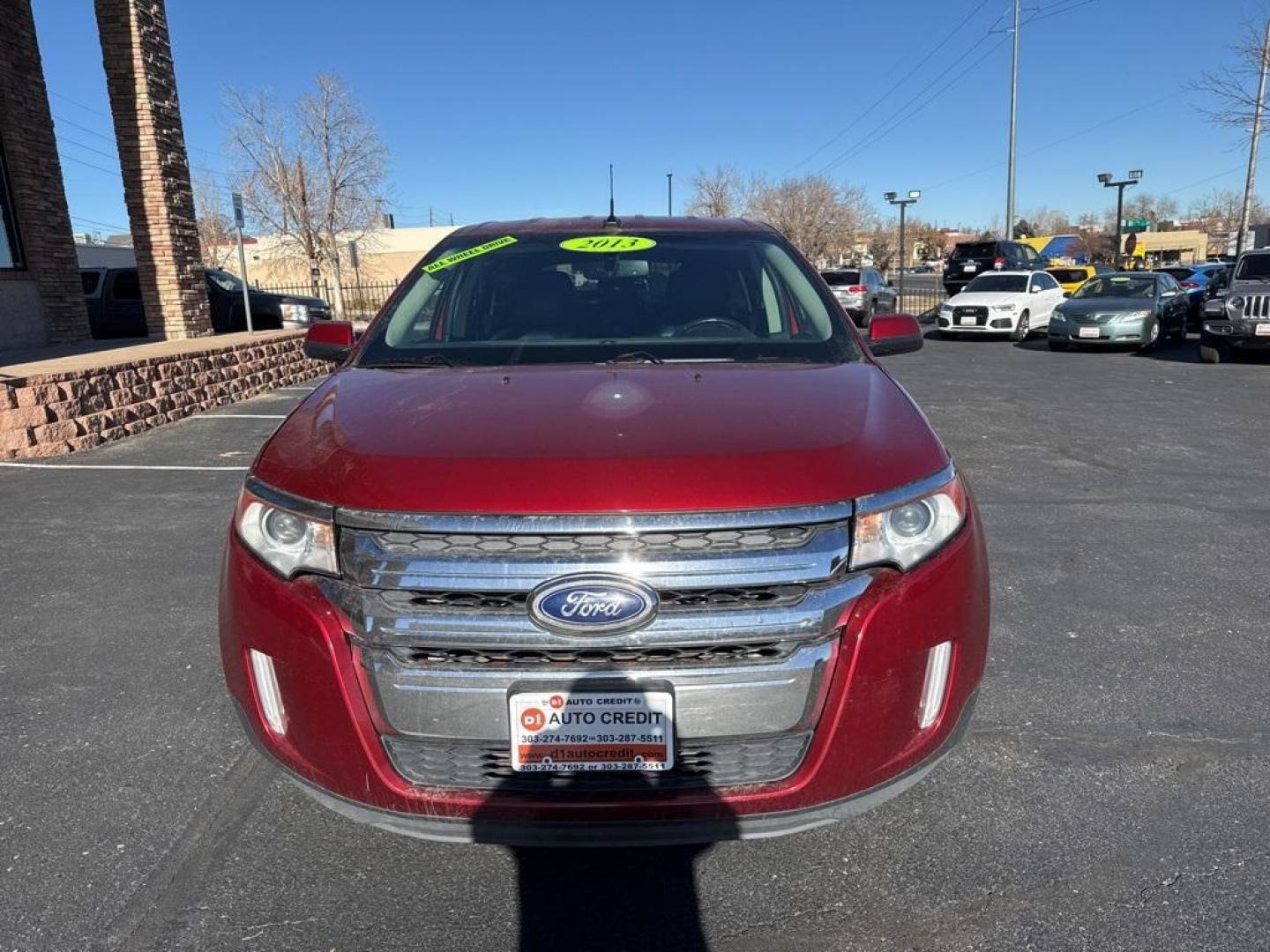 2013 Ruby Red Metallic /Charcoal Black Ford Edge SEL (2FMDK4JC7DB) with an 3.5L V6 Ti-VCT engine, Automatic transmission, located at 8595 Washington St., Thornton, CO, 80229, (303) 287-5511, 39.852348, -104.978447 - 2013 Ford Edge CARFAX One-Owner. AWD AWD.<br><br>D1 Auto NEVER charges dealer fees! All cars have clean titles and have been inspected for mechanical issues. We have financing for everyone. Good credit, bad credit, first time buyers.<br>Odometer is 19551 miles below market average!<br>Please call La - Photo#1