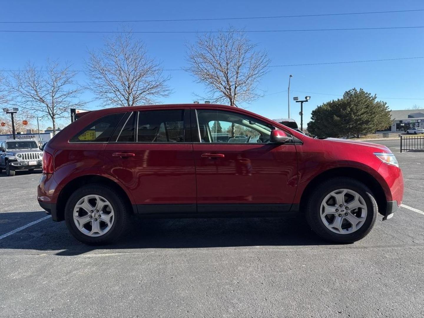 2013 Ruby Red Metallic /Charcoal Black Ford Edge SEL (2FMDK4JC7DB) with an 3.5L V6 Ti-VCT engine, Automatic transmission, located at 8595 Washington St., Thornton, CO, 80229, (303) 287-5511, 39.852348, -104.978447 - 2013 Ford Edge CARFAX One-Owner. AWD AWD.<br><br>D1 Auto NEVER charges dealer fees! All cars have clean titles and have been inspected for mechanical issues. We have financing for everyone. Good credit, bad credit, first time buyers.<br>Odometer is 19551 miles below market average!<br>Please call La - Photo#3