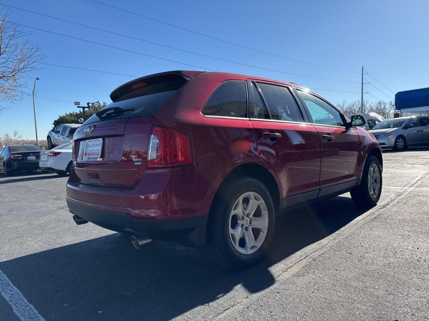 2013 Ruby Red Metallic /Charcoal Black Ford Edge SEL (2FMDK4JC7DB) with an 3.5L V6 Ti-VCT engine, Automatic transmission, located at 8595 Washington St., Thornton, CO, 80229, (303) 287-5511, 39.852348, -104.978447 - 2013 Ford Edge CARFAX One-Owner. AWD AWD.<br><br>D1 Auto NEVER charges dealer fees! All cars have clean titles and have been inspected for mechanical issues. We have financing for everyone. Good credit, bad credit, first time buyers.<br>Odometer is 19551 miles below market average!<br>Please call La - Photo#4