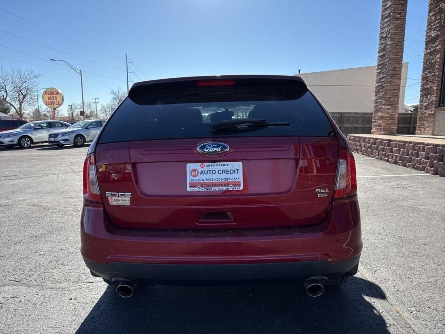 2013 Ruby Red Metallic /Charcoal Black Ford Edge SEL (2FMDK4JC7DB) with an 3.5L V6 Ti-VCT engine, Automatic transmission, located at 8595 Washington St., Thornton, CO, 80229, (303) 287-5511, 39.852348, -104.978447 - 2013 Ford Edge CARFAX One-Owner. AWD AWD.<br><br>D1 Auto NEVER charges dealer fees! All cars have clean titles and have been inspected for mechanical issues. We have financing for everyone. Good credit, bad credit, first time buyers.<br>Odometer is 19551 miles below market average!<br>Please call La - Photo#5