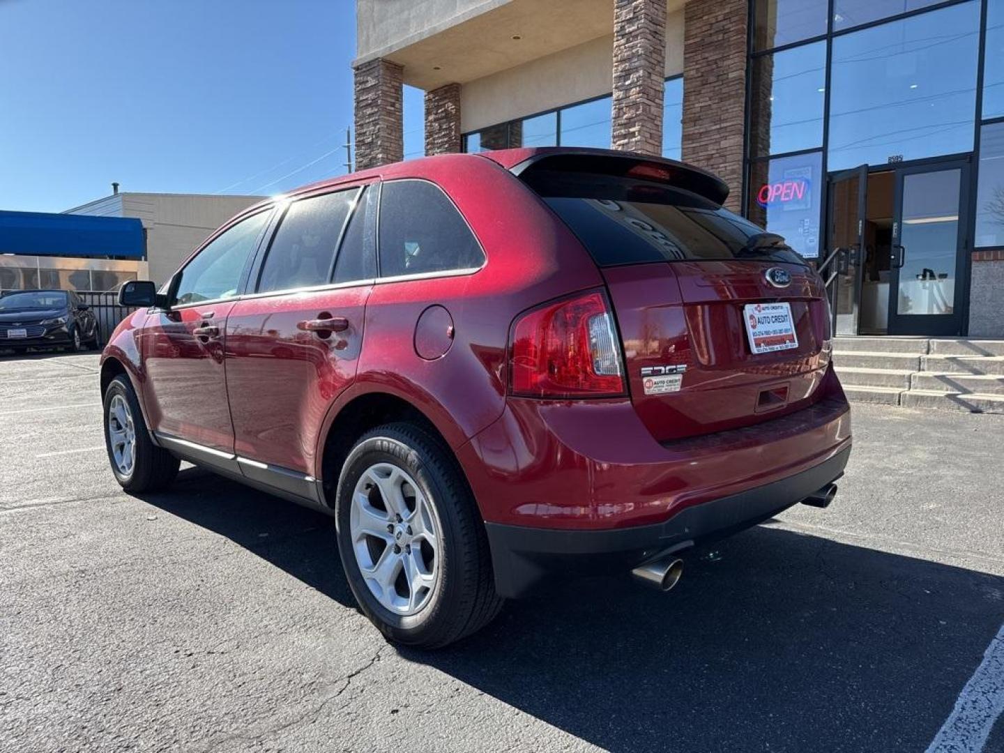 2013 Ruby Red Metallic /Charcoal Black Ford Edge SEL (2FMDK4JC7DB) with an 3.5L V6 Ti-VCT engine, Automatic transmission, located at 8595 Washington St., Thornton, CO, 80229, (303) 287-5511, 39.852348, -104.978447 - 2013 Ford Edge CARFAX One-Owner. AWD AWD.<br><br>D1 Auto NEVER charges dealer fees! All cars have clean titles and have been inspected for mechanical issues. We have financing for everyone. Good credit, bad credit, first time buyers.<br>Odometer is 19551 miles below market average!<br>Please call La - Photo#6