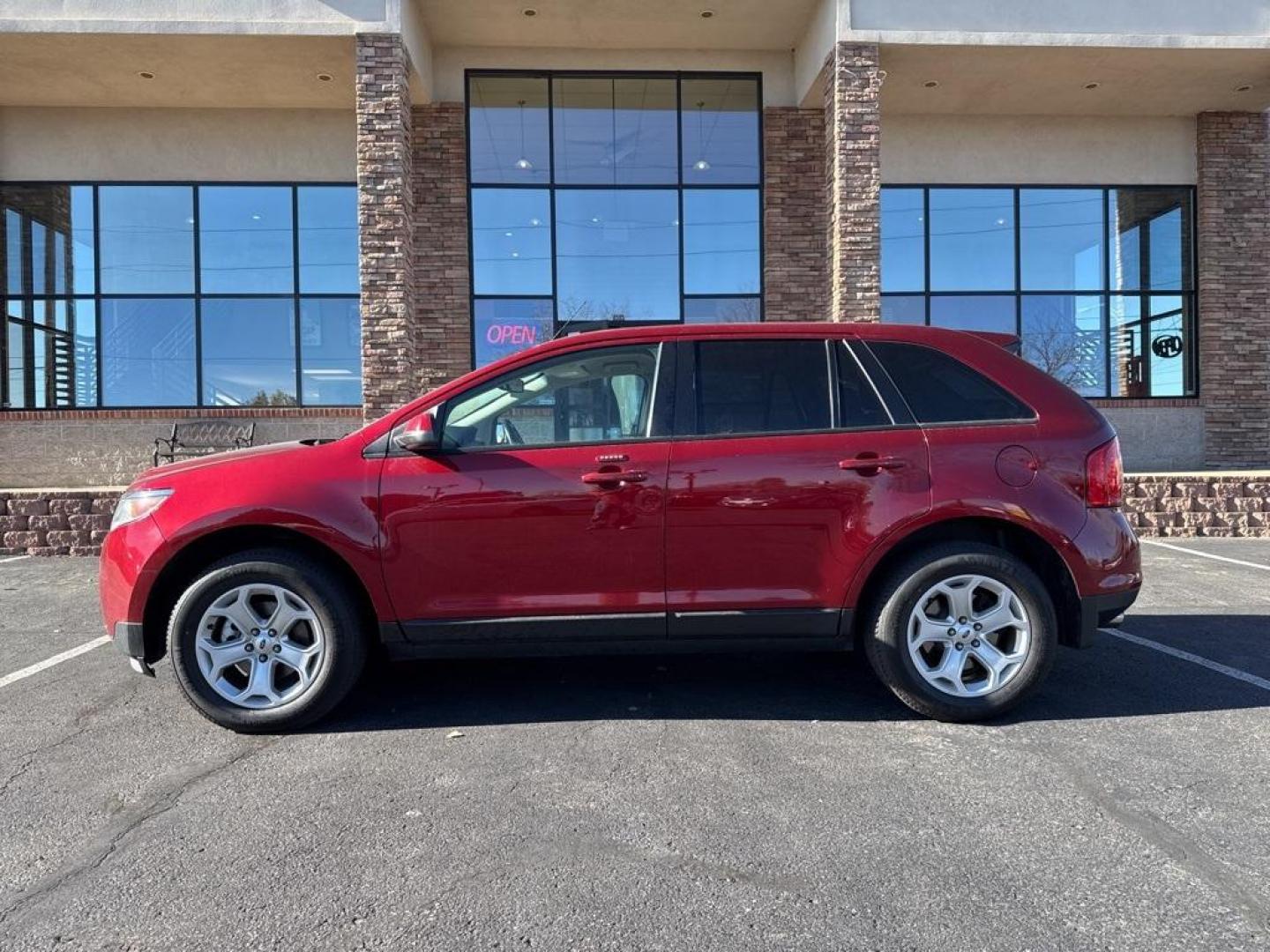 2013 Ruby Red Metallic /Charcoal Black Ford Edge SEL (2FMDK4JC7DB) with an 3.5L V6 Ti-VCT engine, Automatic transmission, located at 8595 Washington St., Thornton, CO, 80229, (303) 287-5511, 39.852348, -104.978447 - 2013 Ford Edge CARFAX One-Owner. AWD AWD.<br><br>D1 Auto NEVER charges dealer fees! All cars have clean titles and have been inspected for mechanical issues. We have financing for everyone. Good credit, bad credit, first time buyers.<br>Odometer is 19551 miles below market average!<br>Please call La - Photo#7