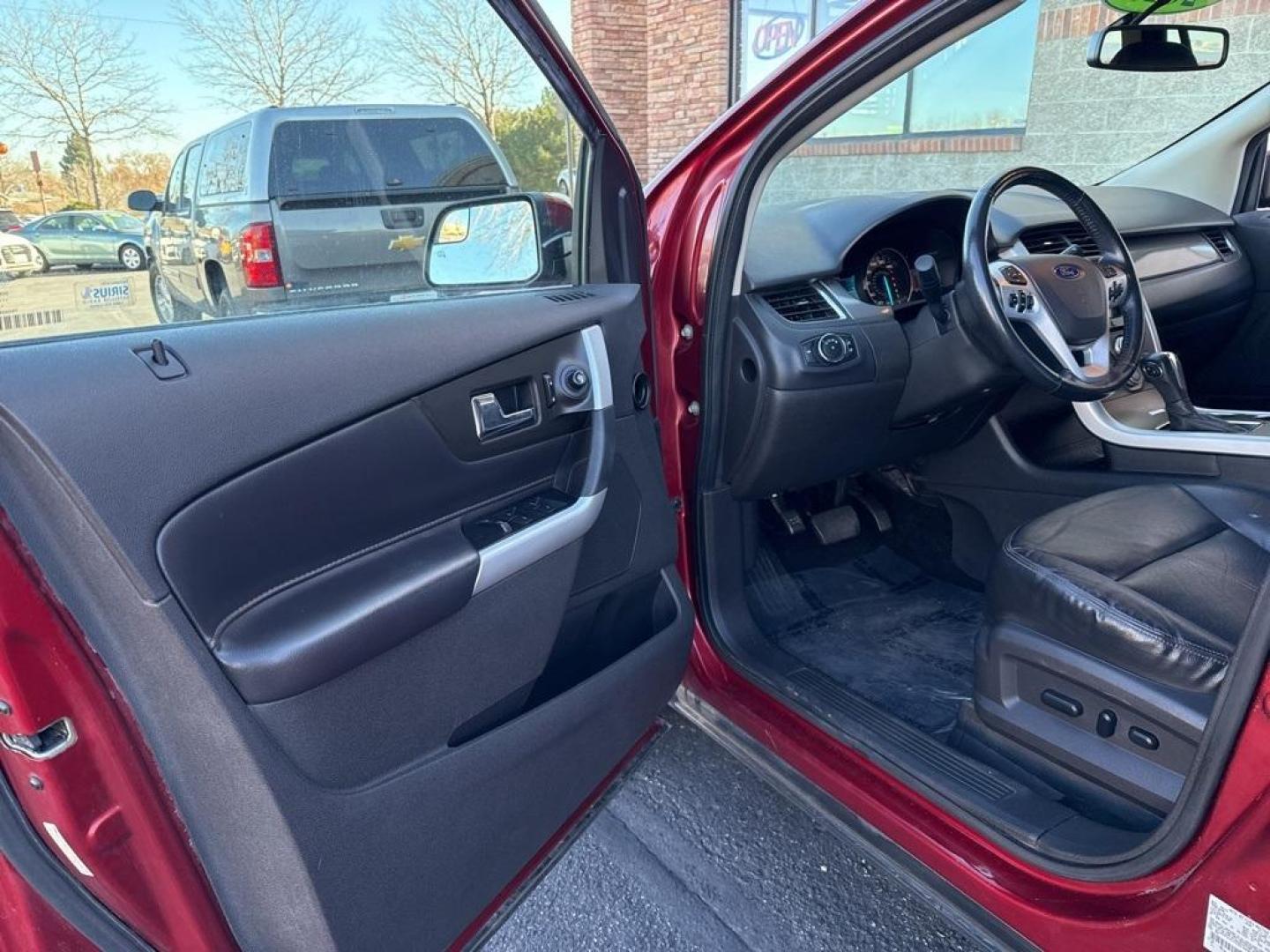 2013 Ruby Red Metallic /Charcoal Black Ford Edge SEL (2FMDK4JC7DB) with an 3.5L V6 Ti-VCT engine, Automatic transmission, located at 8595 Washington St., Thornton, CO, 80229, (303) 287-5511, 39.852348, -104.978447 - 2013 Ford Edge CARFAX One-Owner. AWD AWD.<br><br>D1 Auto NEVER charges dealer fees! All cars have clean titles and have been inspected for mechanical issues. We have financing for everyone. Good credit, bad credit, first time buyers.<br>Odometer is 19551 miles below market average!<br>Please call La - Photo#22