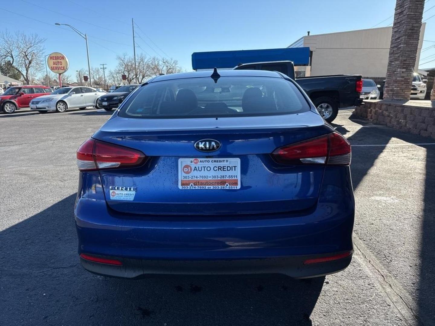 2017 Deep Sea Blue /Black Kia Forte LX (3KPFL4A71HE) with an 2.0L I4 DOHC Dual CVVT engine, Automatic transmission, located at 8595 Washington St., Thornton, CO, 80229, (303) 287-5511, 39.852348, -104.978447 - 2017 Kia Forte FWD<br><br>D1 Auto NEVER charges dealer fees! All cars have clean titles and have been inspected for mechanical issues. We have financing for everyone. Good credit, bad credit, first time buyers.<br><br>Please call Lakewood Location 303-274-7692 or Thornton 303-287-5511 to schedule a - Photo#5