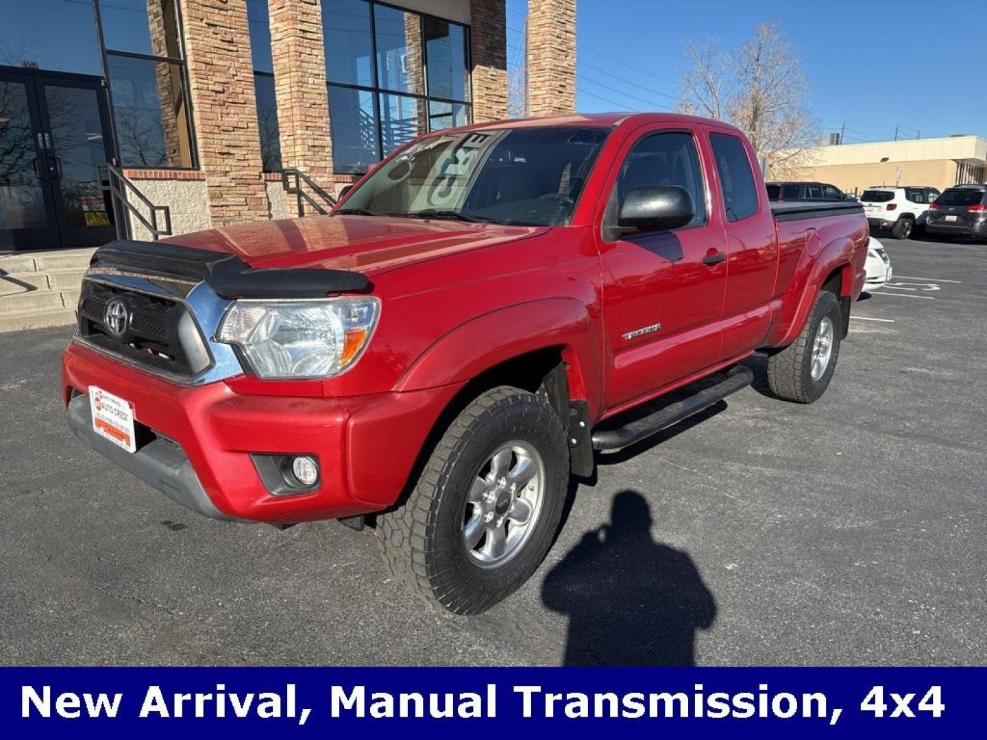 2012 Barcelona Red Metallic /Graphite Toyota Tacoma SR5 (5TFUX4EN6CX) with an 2.7L I4 DOHC 16V engine, Manual transmission, located at 8595 Washington St., Thornton, CO, 80229, (303) 287-5511, 39.852348, -104.978447 - 2012 Toyota Tacoma 4x4, manual transmission, 4cyl that is a 9.7 out of 10 condition wise. Non smoker, no rust and nicely equipped with SR5 package. You will not find a nicer one anywhere. <br><br>All Cars Have Clean Titles And Are Serviced Before Sale., Backup Camera, Non Smoker, No Pet Odor Or Hair - Photo#0