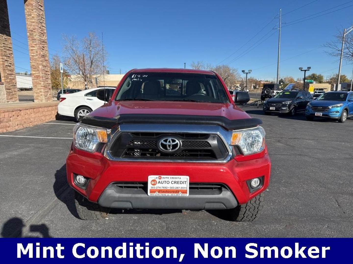 2012 Barcelona Red Metallic /Graphite Toyota Tacoma SR5 (5TFUX4EN6CX) with an 2.7L I4 DOHC 16V engine, Manual transmission, located at 8595 Washington St., Thornton, CO, 80229, (303) 287-5511, 39.852348, -104.978447 - 2012 Toyota Tacoma 4x4, manual transmission, 4cyl that is a 9.7 out of 10 condition wise. Non smoker, no rust and nicely equipped with SR5 package. You will not find a nicer one anywhere. <br><br>All Cars Have Clean Titles And Are Serviced Before Sale., Backup Camera, Non Smoker, No Pet Odor Or Hair - Photo#1