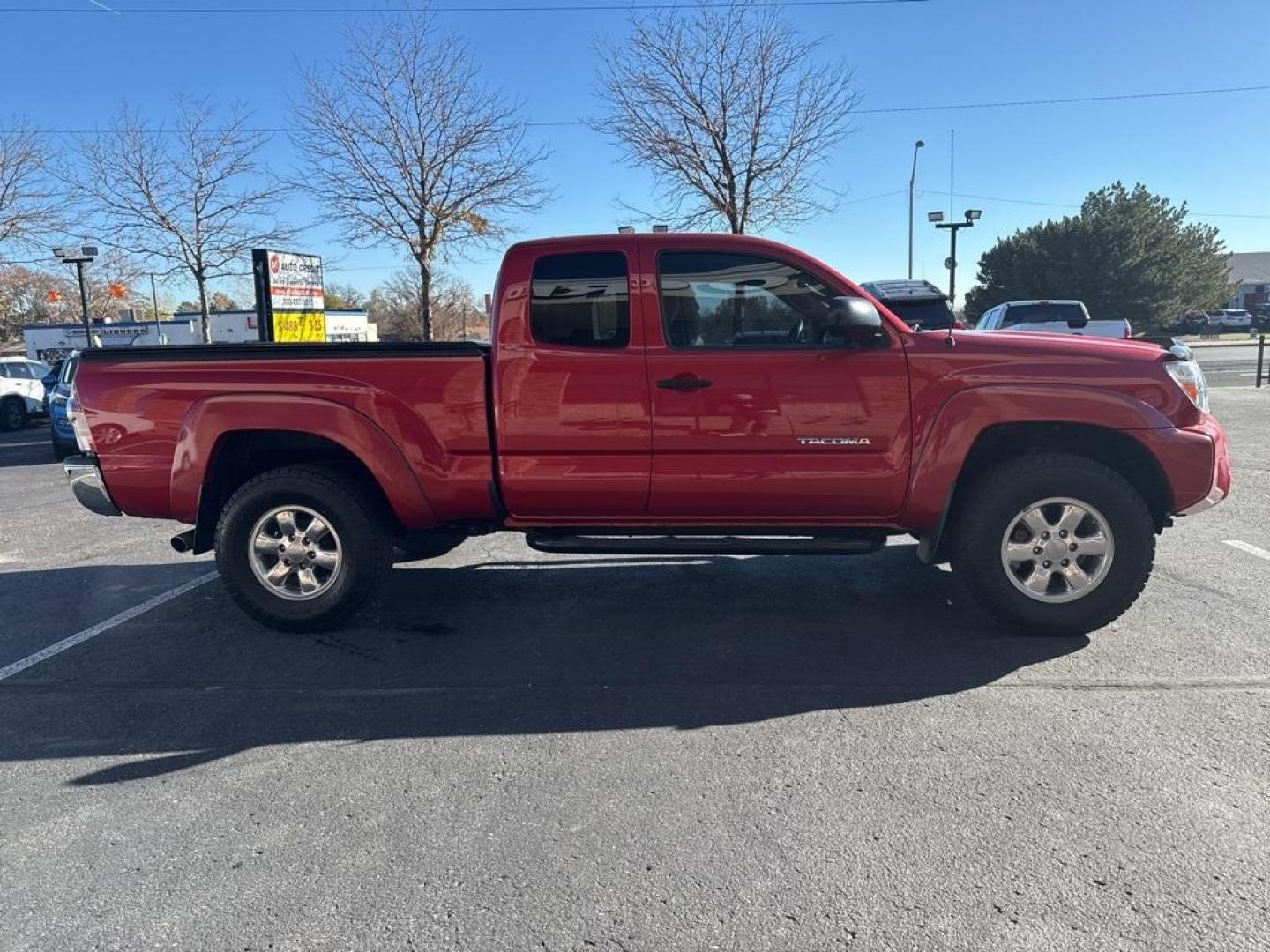 2012 Barcelona Red Metallic /Graphite Toyota Tacoma SR5 (5TFUX4EN6CX) with an 2.7L I4 DOHC 16V engine, Manual transmission, located at 8595 Washington St., Thornton, CO, 80229, (303) 287-5511, 39.852348, -104.978447 - 2012 Toyota Tacoma 4x4, manual transmission, 4cyl that is a 9.7 out of 10 condition wise. Non smoker, no rust and nicely equipped with SR5 package. You will not find a nicer one anywhere. <br><br>All Cars Have Clean Titles And Are Serviced Before Sale., Backup Camera, Non Smoker, No Pet Odor Or Hair - Photo#3