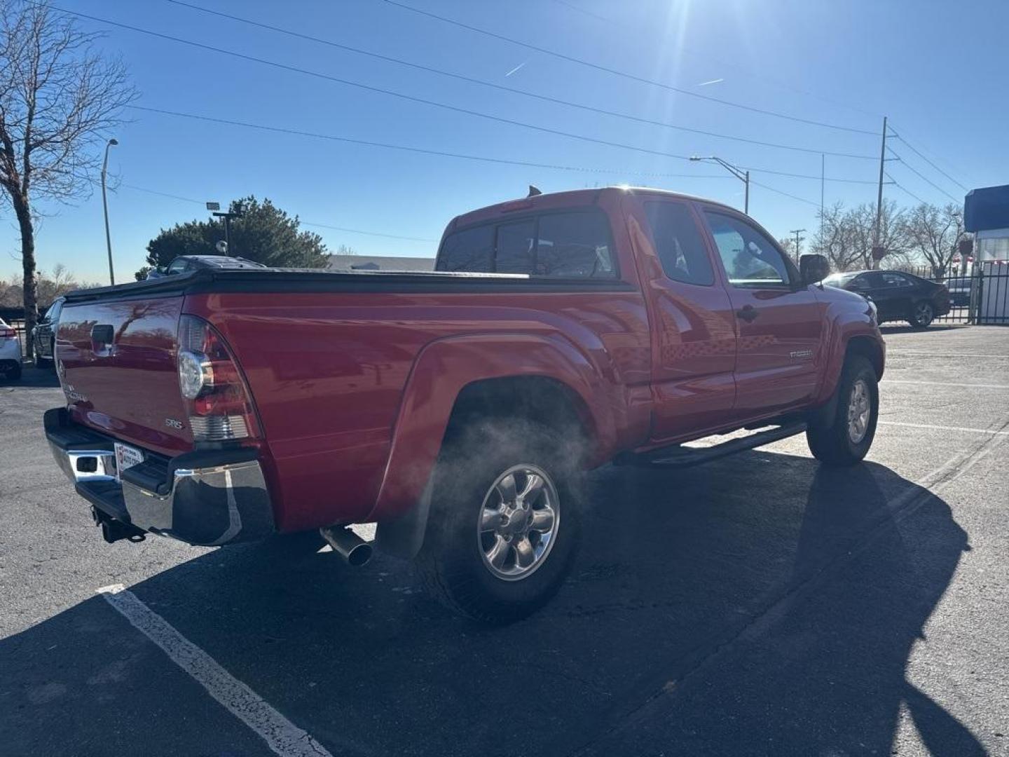 2012 Barcelona Red Metallic /Graphite Toyota Tacoma SR5 (5TFUX4EN6CX) with an 2.7L I4 DOHC 16V engine, Manual transmission, located at 8595 Washington St., Thornton, CO, 80229, (303) 287-5511, 39.852348, -104.978447 - 2012 Toyota Tacoma 4x4, manual transmission, 4cyl that is a 9.7 out of 10 condition wise. Non smoker, no rust and nicely equipped with SR5 package. You will not find a nicer one anywhere. <br><br>All Cars Have Clean Titles And Are Serviced Before Sale., Backup Camera, Non Smoker, No Pet Odor Or Hair - Photo#4