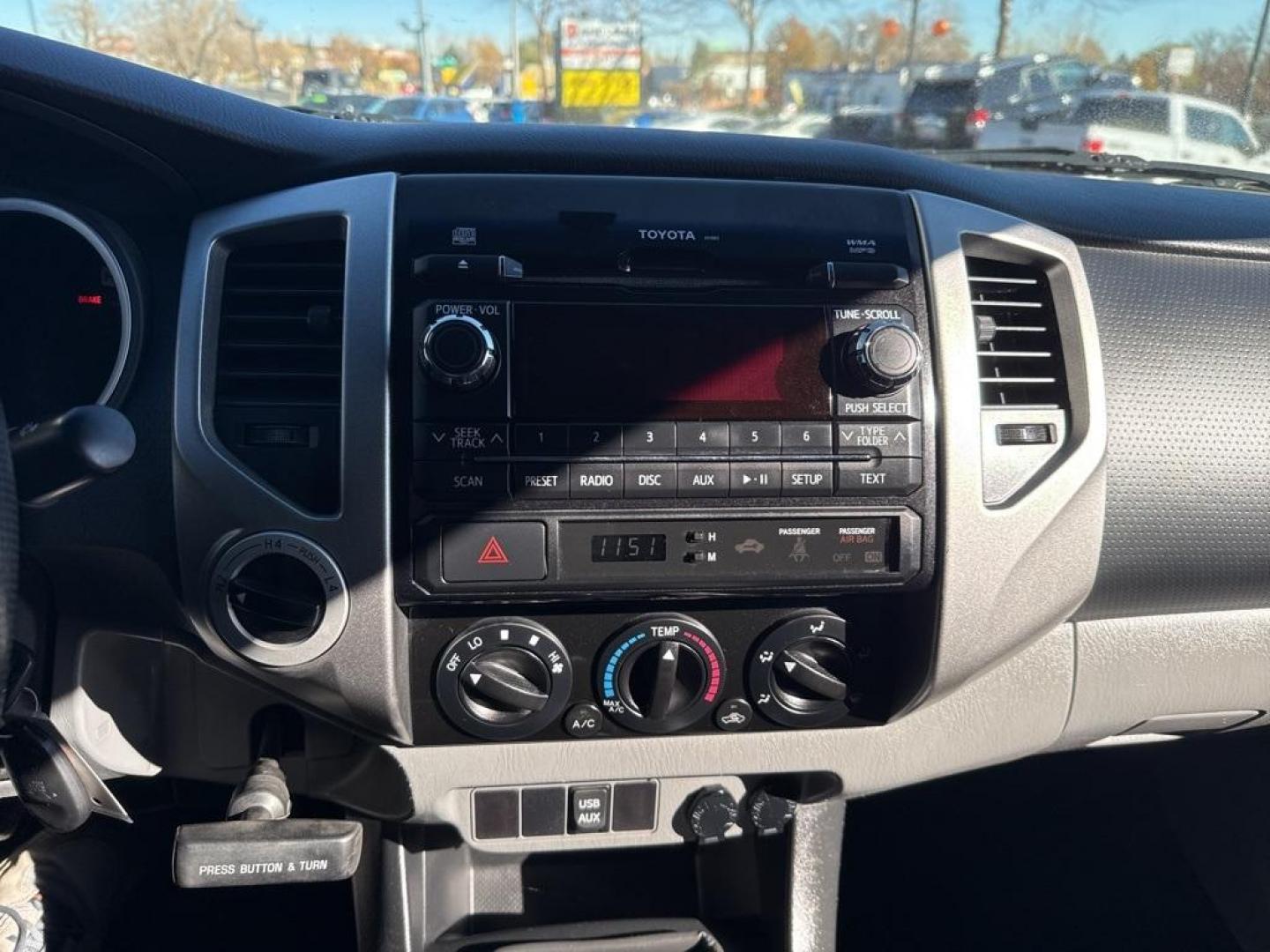 2012 Barcelona Red Metallic /Graphite Toyota Tacoma SR5 (5TFUX4EN6CX) with an 2.7L I4 DOHC 16V engine, Manual transmission, located at 8595 Washington St., Thornton, CO, 80229, (303) 287-5511, 39.852348, -104.978447 - 2012 Toyota Tacoma 4x4, manual transmission, 4cyl that is a 9.7 out of 10 condition wise. Non smoker, no rust and nicely equipped with SR5 package. You will not find a nicer one anywhere. <br><br>All Cars Have Clean Titles And Are Serviced Before Sale., Backup Camera, Non Smoker, No Pet Odor Or Hair - Photo#11