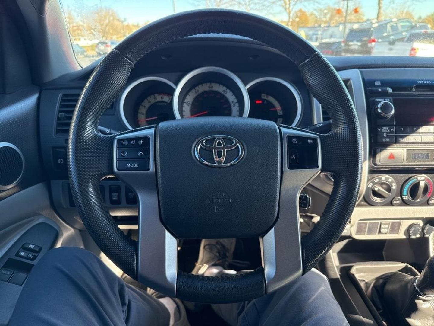 2012 Barcelona Red Metallic /Graphite Toyota Tacoma SR5 (5TFUX4EN6CX) with an 2.7L I4 DOHC 16V engine, Manual transmission, located at 8595 Washington St., Thornton, CO, 80229, (303) 287-5511, 39.852348, -104.978447 - 2012 Toyota Tacoma 4x4, manual transmission, 4cyl that is a 9.7 out of 10 condition wise. Non smoker, no rust and nicely equipped with SR5 package. You will not find a nicer one anywhere. <br><br>All Cars Have Clean Titles And Are Serviced Before Sale., Backup Camera, Non Smoker, No Pet Odor Or Hair - Photo#20