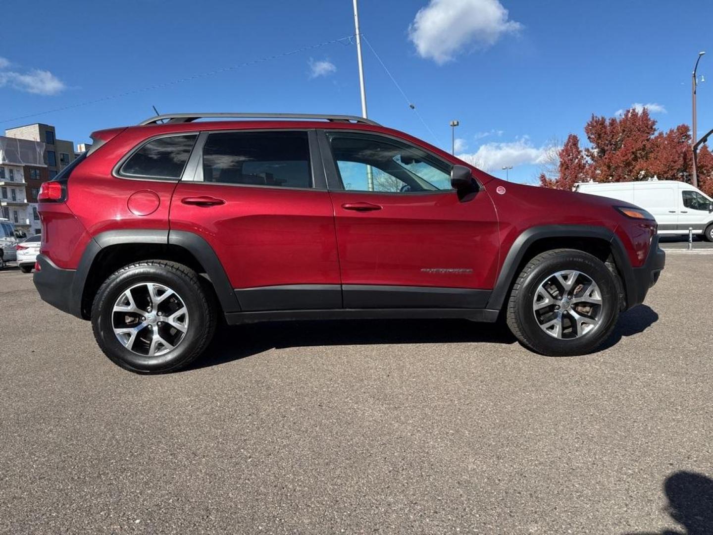 2014 Deep Cherry Red Crystal Pearlcoat /Black Jeep Cherokee Trailhawk (1C4PJMBS0EW) with an 3.2L V6 engine, Automatic transmission, located at 8595 Washington St., Thornton, CO, 80229, (303) 287-5511, 39.852348, -104.978447 - 2014 Jeep Cherokee with very low miles and in excellent condition inside and out. Loaded with the powerful V6 engine, panoramic sun roof, heated leather seats, heated steering wheel, navigation, backup camera and much more. Fully serviced in our shop. We offer a wide range of warranties. <br><br>All - Photo#3