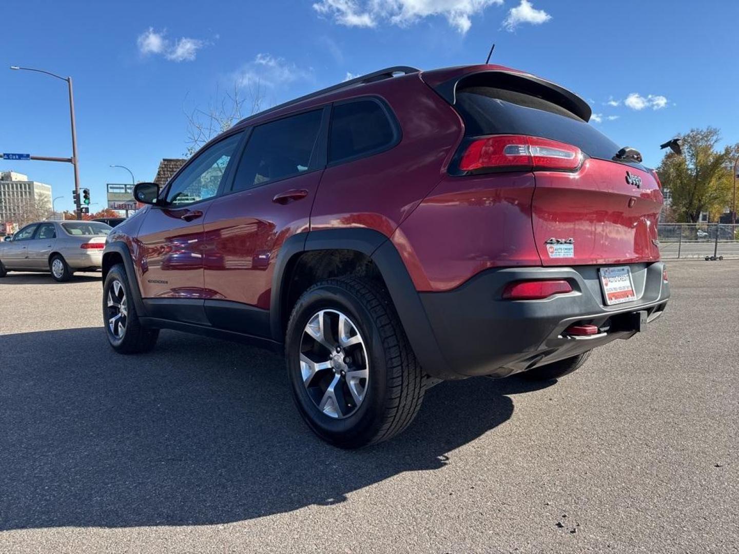 2014 Deep Cherry Red Crystal Pearlcoat /Black Jeep Cherokee Trailhawk (1C4PJMBS0EW) with an 3.2L V6 engine, Automatic transmission, located at 8595 Washington St., Thornton, CO, 80229, (303) 287-5511, 39.852348, -104.978447 - 2014 Jeep Cherokee with very low miles and in excellent condition inside and out. Loaded with the powerful V6 engine, panoramic sun roof, heated leather seats, heated steering wheel, navigation, backup camera and much more. Fully serviced in our shop. We offer a wide range of warranties. <br><br>All - Photo#6