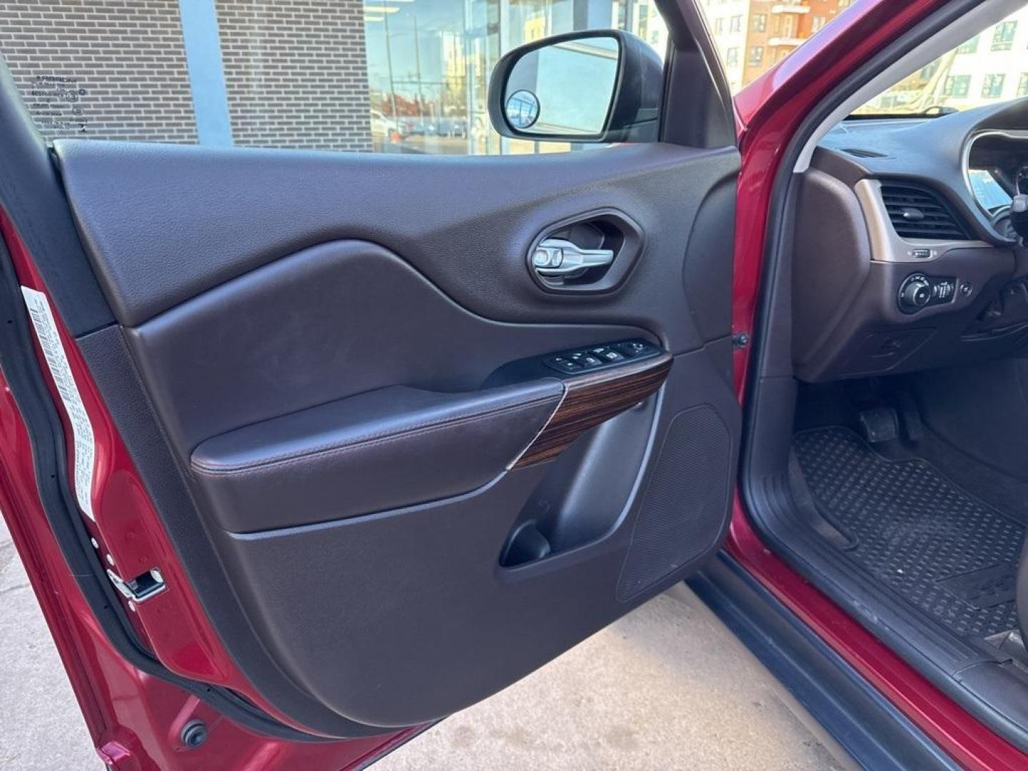 2014 Deep Cherry Red Crystal Pearlcoat /Black Jeep Cherokee Trailhawk (1C4PJMBS0EW) with an 3.2L V6 engine, Automatic transmission, located at 8595 Washington St., Thornton, CO, 80229, (303) 287-5511, 39.852348, -104.978447 - 2014 Jeep Cherokee with very low miles and in excellent condition inside and out. Loaded with the powerful V6 engine, panoramic sun roof, heated leather seats, heated steering wheel, navigation, backup camera and much more. Fully serviced in our shop. We offer a wide range of warranties. <br><br>All - Photo#23