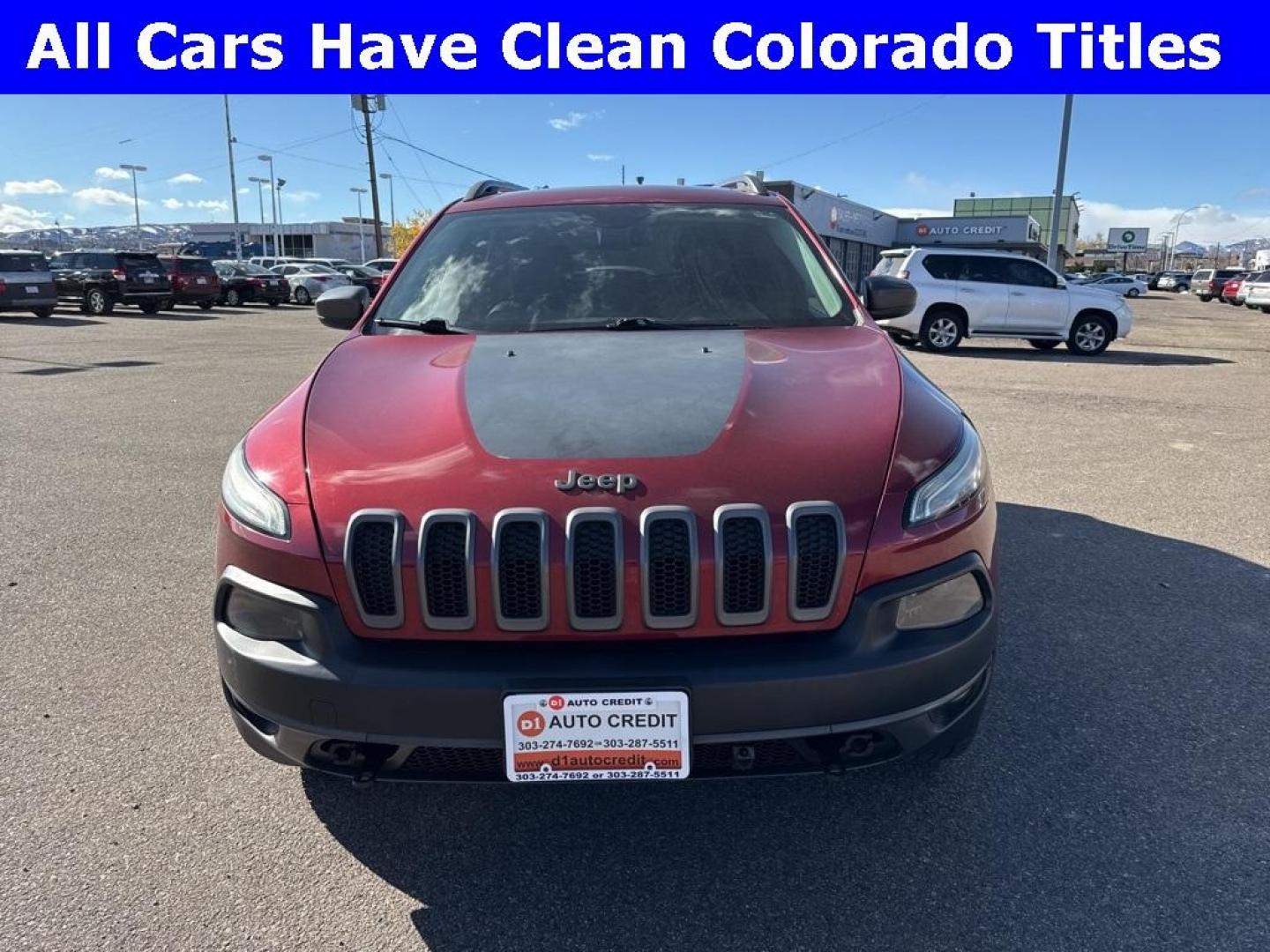 2014 Deep Cherry Red Crystal Pearlcoat /Black Jeep Cherokee Trailhawk (1C4PJMBS0EW) with an 3.2L V6 engine, Automatic transmission, located at 8595 Washington St., Thornton, CO, 80229, (303) 287-5511, 39.852348, -104.978447 - 2014 Jeep Cherokee with very low miles and in excellent condition inside and out. Loaded with the powerful V6 engine, panoramic sun roof, heated leather seats, heated steering wheel, navigation, backup camera and much more. Fully serviced in our shop. We offer a wide range of warranties. <br><br>All - Photo#1