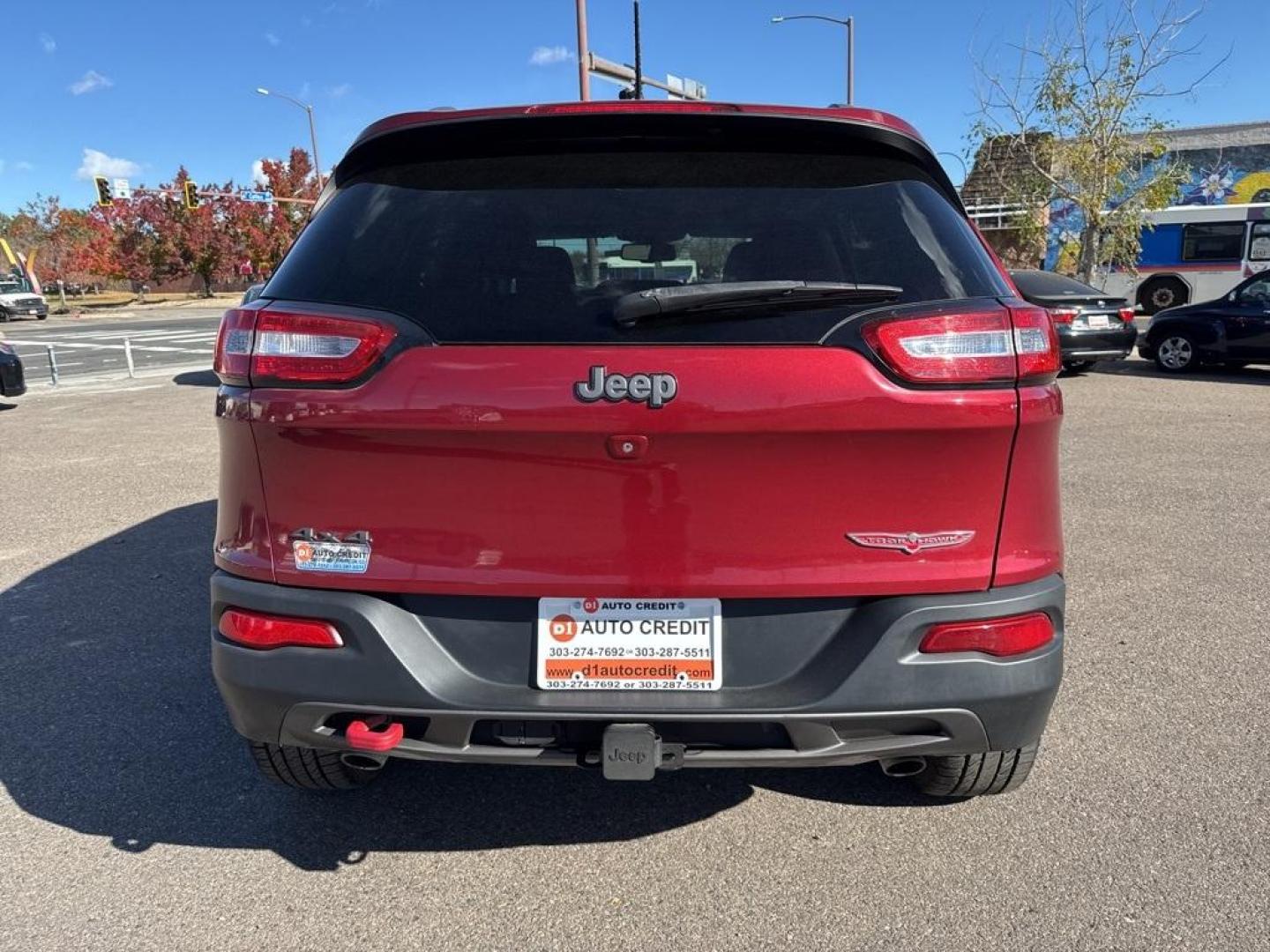 2014 Deep Cherry Red Crystal Pearlcoat /Black Jeep Cherokee Trailhawk (1C4PJMBS0EW) with an 3.2L V6 engine, Automatic transmission, located at 8595 Washington St., Thornton, CO, 80229, (303) 287-5511, 39.852348, -104.978447 - 2014 Jeep Cherokee with very low miles and in excellent condition inside and out. Loaded with the powerful V6 engine, panoramic sun roof, heated leather seats, heated steering wheel, navigation, backup camera and much more. Fully serviced in our shop. We offer a wide range of warranties. <br><br>All - Photo#6