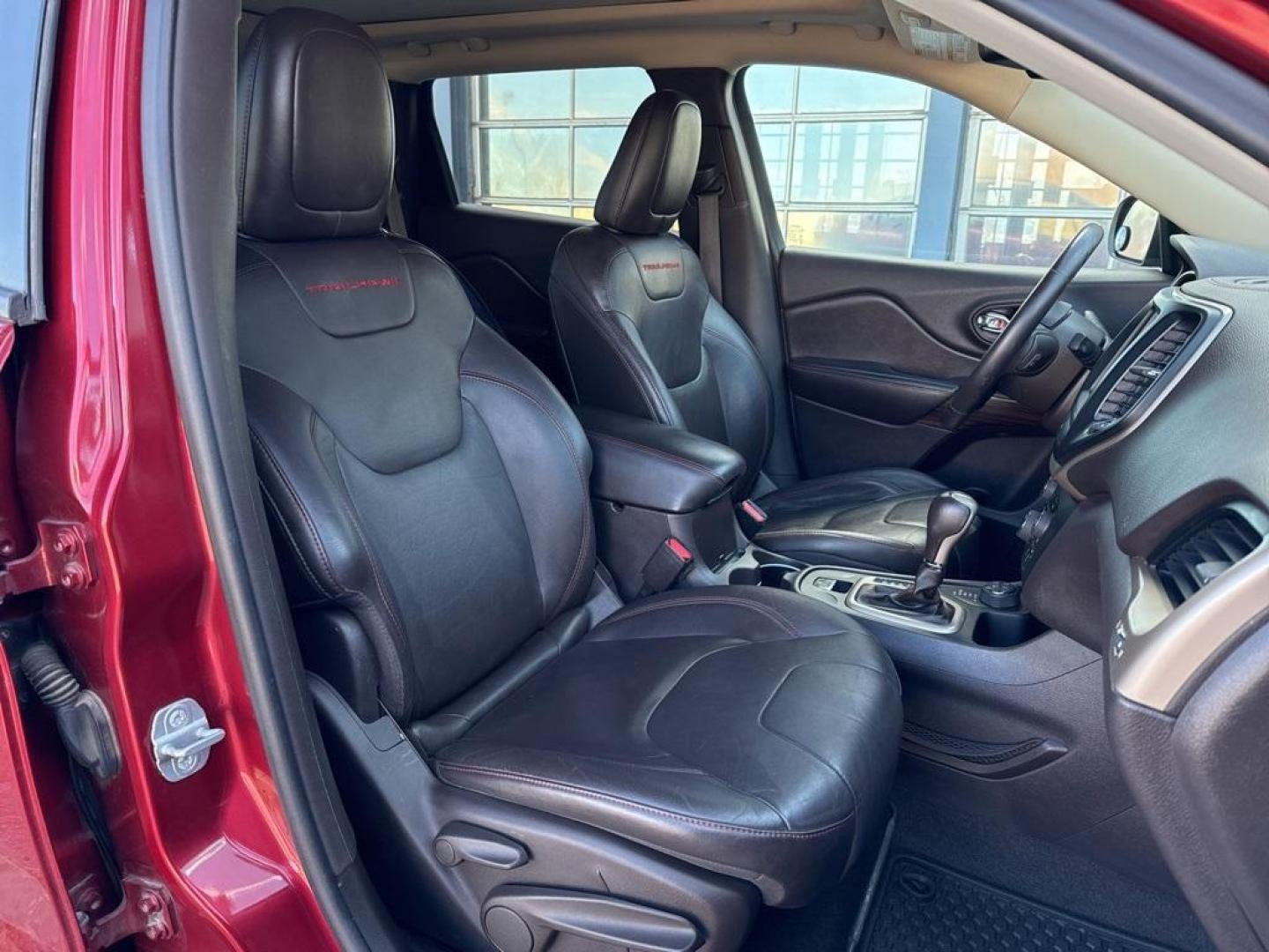 2014 Deep Cherry Red Crystal Pearlcoat /Black Jeep Cherokee Trailhawk (1C4PJMBS0EW) with an 3.2L V6 engine, Automatic transmission, located at 8595 Washington St., Thornton, CO, 80229, (303) 287-5511, 39.852348, -104.978447 - 2014 Jeep Cherokee with very low miles and in excellent condition inside and out. Loaded with the powerful V6 engine, panoramic sun roof, heated leather seats, heated steering wheel, navigation, backup camera and much more. Fully serviced in our shop. We offer a wide range of warranties. <br><br>All - Photo#15