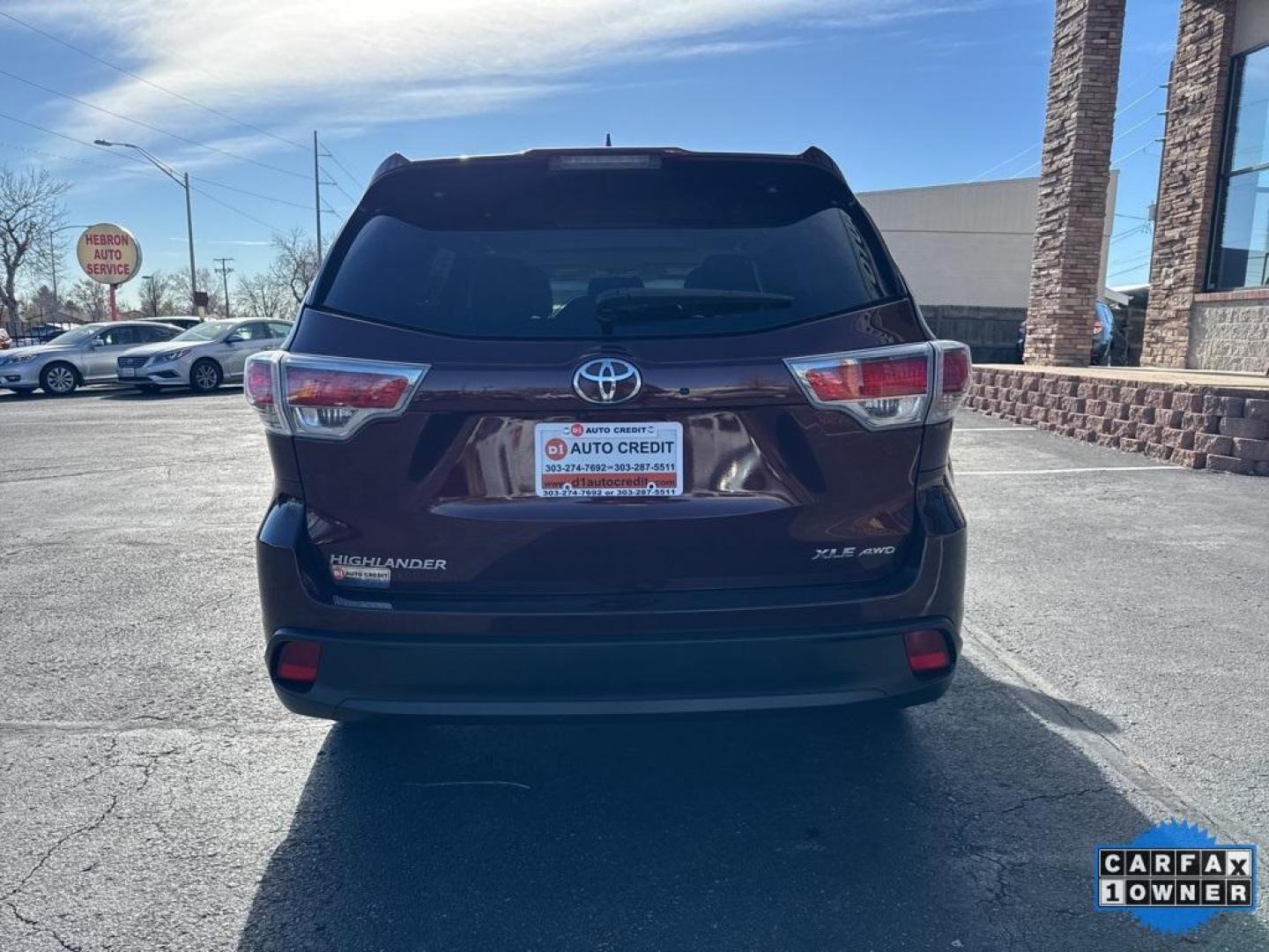 2016 Ooh La La Rouge Mica /Almond Toyota Highlander XLE V6 (5TDJKRFH1GS) with an 3.5L V6 DOHC Dual VVT-i 24V engine, Automatic transmission, located at 8595 Washington St., Thornton, CO, 80229, (303) 287-5511, 39.852348, -104.978447 - 2016 Toyota Highlander CARFAX One-Owner, AWD and in excellent condition inside and out. <br><br> All Cars Have Clean Titles And Are Serviced Before Sale., CarfaxOne Owner, No Accidents, Backup Camera, Leather, Heated Seats, Bluetooth/ With Bluetooth Audio, Non Smoker, No Pet Odor Or Hair, Highlande - Photo#5