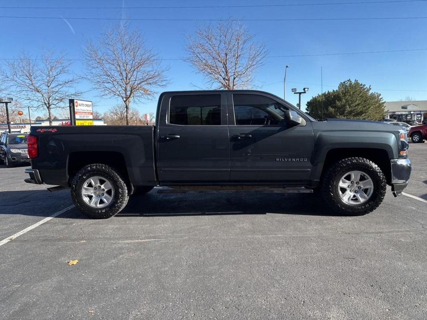 2017 Graphite Metallic /Cocoa/Dune Chevrolet Silverado 1500 LT (3GCUKREC1HG) with an V8 engine, Automatic transmission, located at 8595 Washington St., Thornton, CO, 80229, (303) 287-5511, 39.852348, -104.978447 - 2017 Chevrolet Silverado 1500 4WD LT1 that has just had a complete tune up including, new brakes front and rear, spark plugs, shocks front and rear, oil change and filters, new tires. This truck is in tiptop shape inside and out! No accidents, non smoker truck that shows no signs of abuse. <br><br> - Photo#3