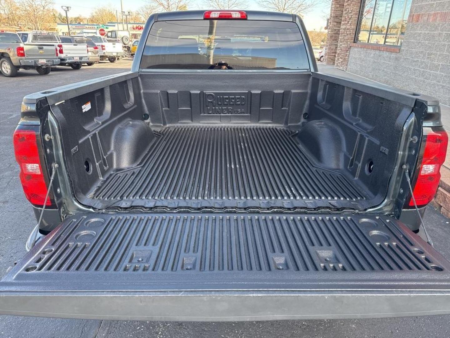 2017 Graphite Metallic /Cocoa/Dune Chevrolet Silverado 1500 LT (3GCUKREC1HG) with an V8 engine, Automatic transmission, located at 8595 Washington St., Thornton, CO, 80229, (303) 287-5511, 39.852348, -104.978447 - 2017 Chevrolet Silverado 1500 4WD LT1 that has just had a complete tune up including, new brakes front and rear, spark plugs, shocks front and rear, oil change and filters, new tires. This truck is in tiptop shape inside and out! No accidents, non smoker truck that shows no signs of abuse. <br><br> - Photo#27