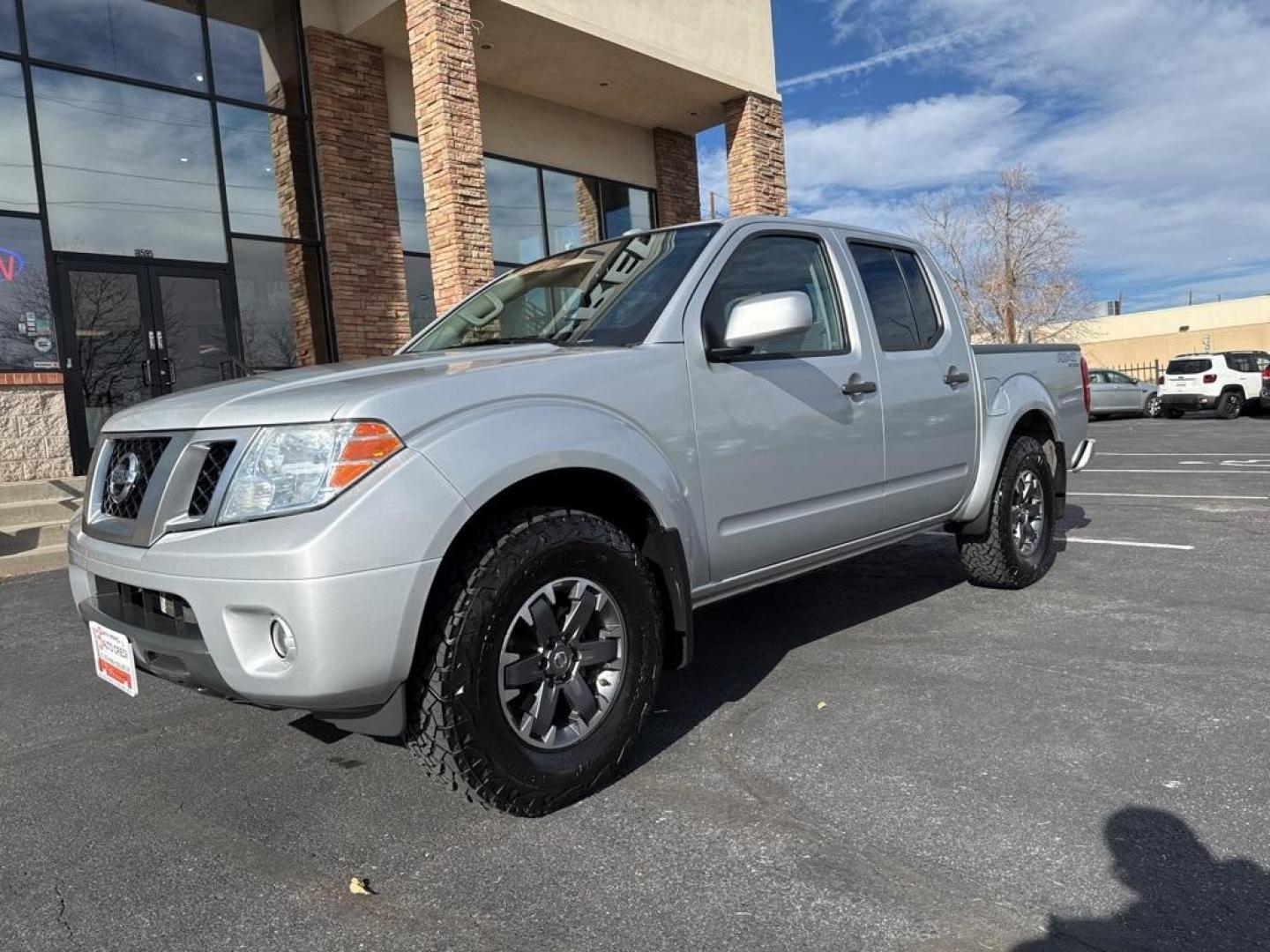 2018 Brilliant Silver /Graphite Nissan Frontier PRO-4X (1N6AD0EVXJN) with an 4.0L V6 DOHC engine, Automatic transmission, located at 8595 Washington St., Thornton, CO, 80229, (303) 287-5511, 39.852348, -104.978447 - 2018 Nissan Frontier PRO -4X 4WD in mint condition inside and out. This non smoker shows no signs of abuse anywhere and is rust free. Clean Colorado title and ready to go!! <br><br>All Cars Have Clean Titles And Are Serviced Before Sale., Clean Carfax, No Accident, Heated Seats, Apple/Android Car Pl - Photo#0