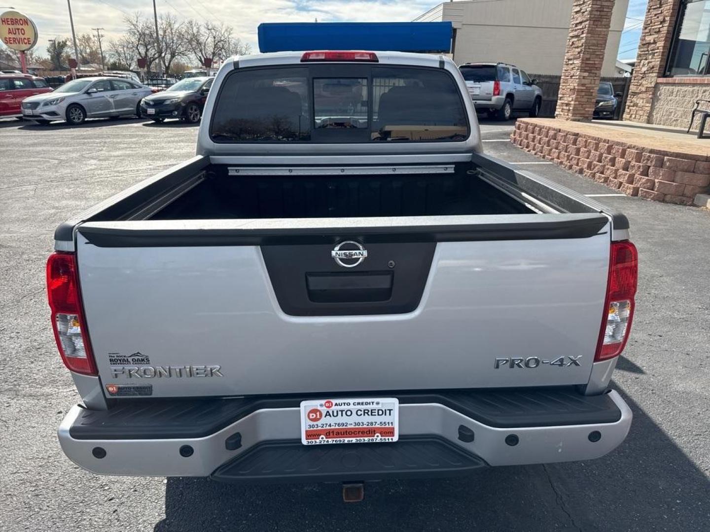 2018 Brilliant Silver /Graphite Nissan Frontier PRO-4X (1N6AD0EVXJN) with an 4.0L V6 DOHC engine, Automatic transmission, located at 8595 Washington St., Thornton, CO, 80229, (303) 287-5511, 39.852348, -104.978447 - 2018 Nissan Frontier PRO -4X 4WD in mint condition inside and out. This non smoker shows no signs of abuse anywhere and is rust free. Clean Colorado title and ready to go!! <br><br>All Cars Have Clean Titles And Are Serviced Before Sale., Clean Carfax, No Accident, Heated Seats, Apple/Android Car Pl - Photo#5