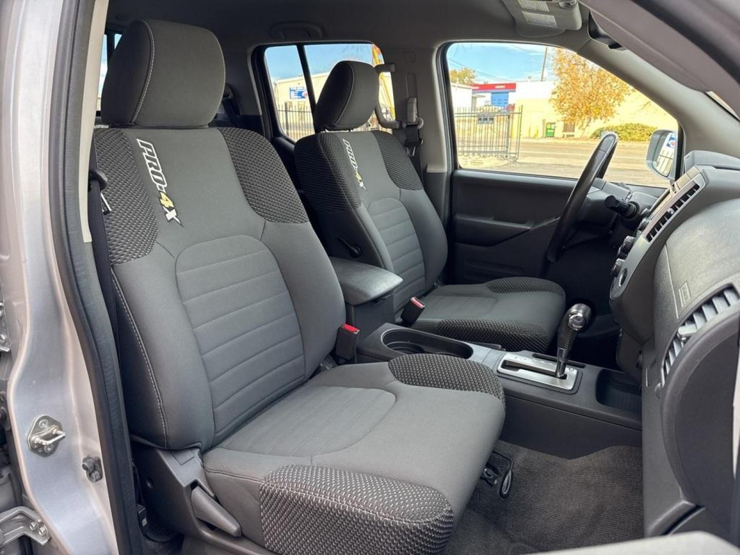 2018 Brilliant Silver /Graphite Nissan Frontier PRO-4X (1N6AD0EVXJN) with an 4.0L V6 DOHC engine, Automatic transmission, located at 8595 Washington St., Thornton, CO, 80229, (303) 287-5511, 39.852348, -104.978447 - 2018 Nissan Frontier PRO -4X 4WD in mint condition inside and out. This non smoker shows no signs of abuse anywhere and is rust free. Clean Colorado title and ready to go!! <br><br>All Cars Have Clean Titles And Are Serviced Before Sale., Clean Carfax, No Accident, Heated Seats, Apple/Android Car Pl - Photo#13