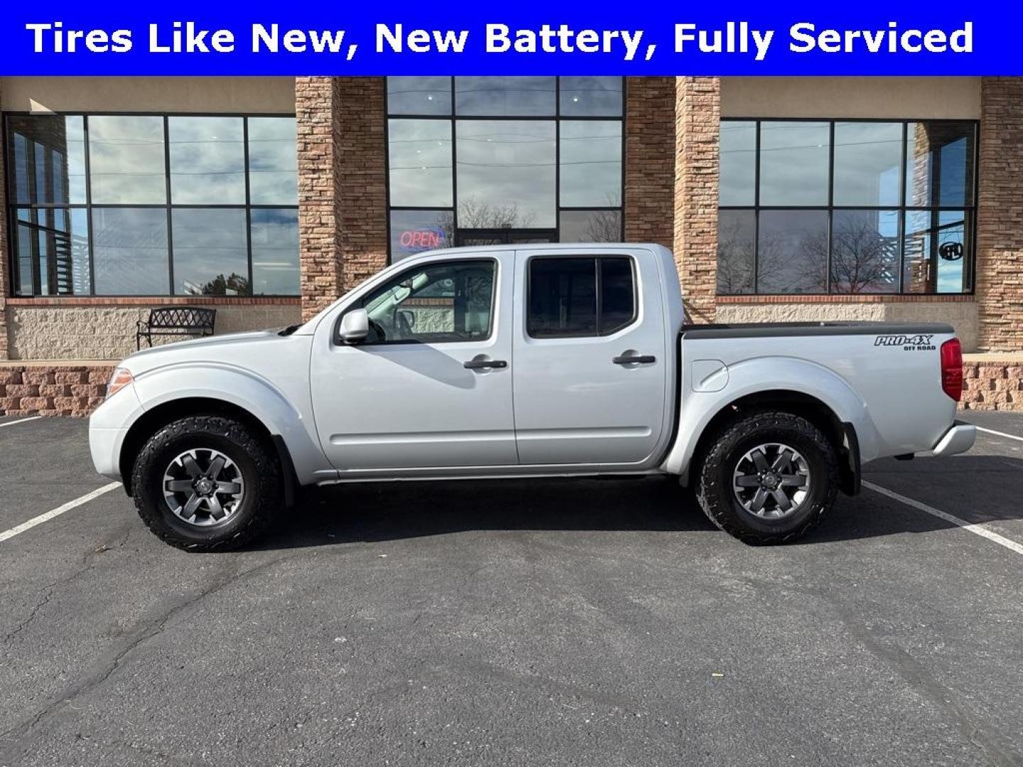 2018 Brilliant Silver /Graphite Nissan Frontier PRO-4X (1N6AD0EVXJN) with an 4.0L V6 DOHC engine, Automatic transmission, located at 8595 Washington St., Thornton, CO, 80229, (303) 287-5511, 39.852348, -104.978447 - 2018 Nissan Frontier PRO -4X 4WD in mint condition inside and out. This non smoker shows no signs of abuse anywhere and is rust free. Clean Colorado title and ready to go!! <br><br>All Cars Have Clean Titles And Are Serviced Before Sale., Clean Carfax, No Accident, Heated Seats, Apple/Android Car Pl - Photo#4