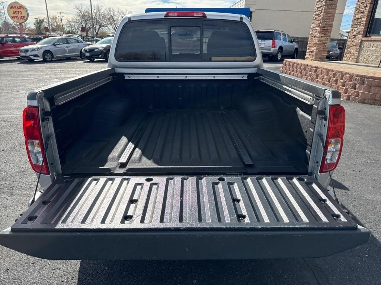 2018 Brilliant Silver /Graphite Nissan Frontier PRO-4X (1N6AD0EVXJN) with an 4.0L V6 DOHC engine, Automatic transmission, located at 8595 Washington St., Thornton, CO, 80229, (303) 287-5511, 39.852348, -104.978447 - 2018 Nissan Frontier PRO -4X 4WD in mint condition inside and out. This non smoker shows no signs of abuse anywhere and is rust free. Clean Colorado title and ready to go!! <br><br>All Cars Have Clean Titles And Are Serviced Before Sale., Clean Carfax, No Accident, Heated Seats, Apple/Android Car Pl - Photo#15