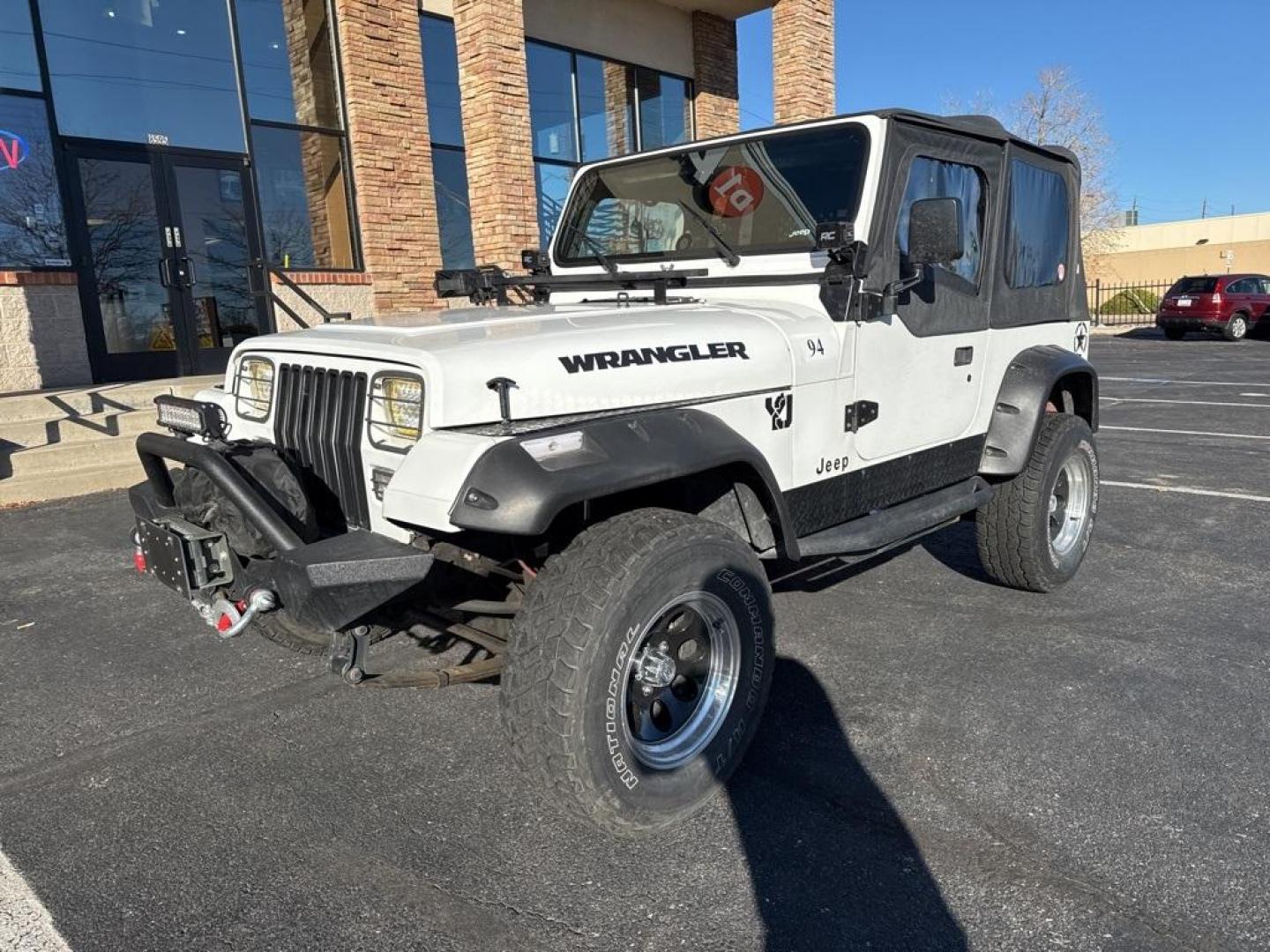 1994 White /Black Jeep Wrangler S (1J4FY19P2RP) with an 2.5L I4 8V engine, Automatic transmission, located at 8595 Washington St., Thornton, CO, 80229, (303) 287-5511, 39.852348, -104.978447 - 1994 Jeep Wrangler 4WD that someone spent a lot of time and money rebuilding so you dont need to! Rebuilt from the ground up and runs great. Lots of extras goodies and ready for any sort of adventure. <br><br>D1 Auto NEVER charges dealer fees! All cars have clean titles and have been inspected for m - Photo#7