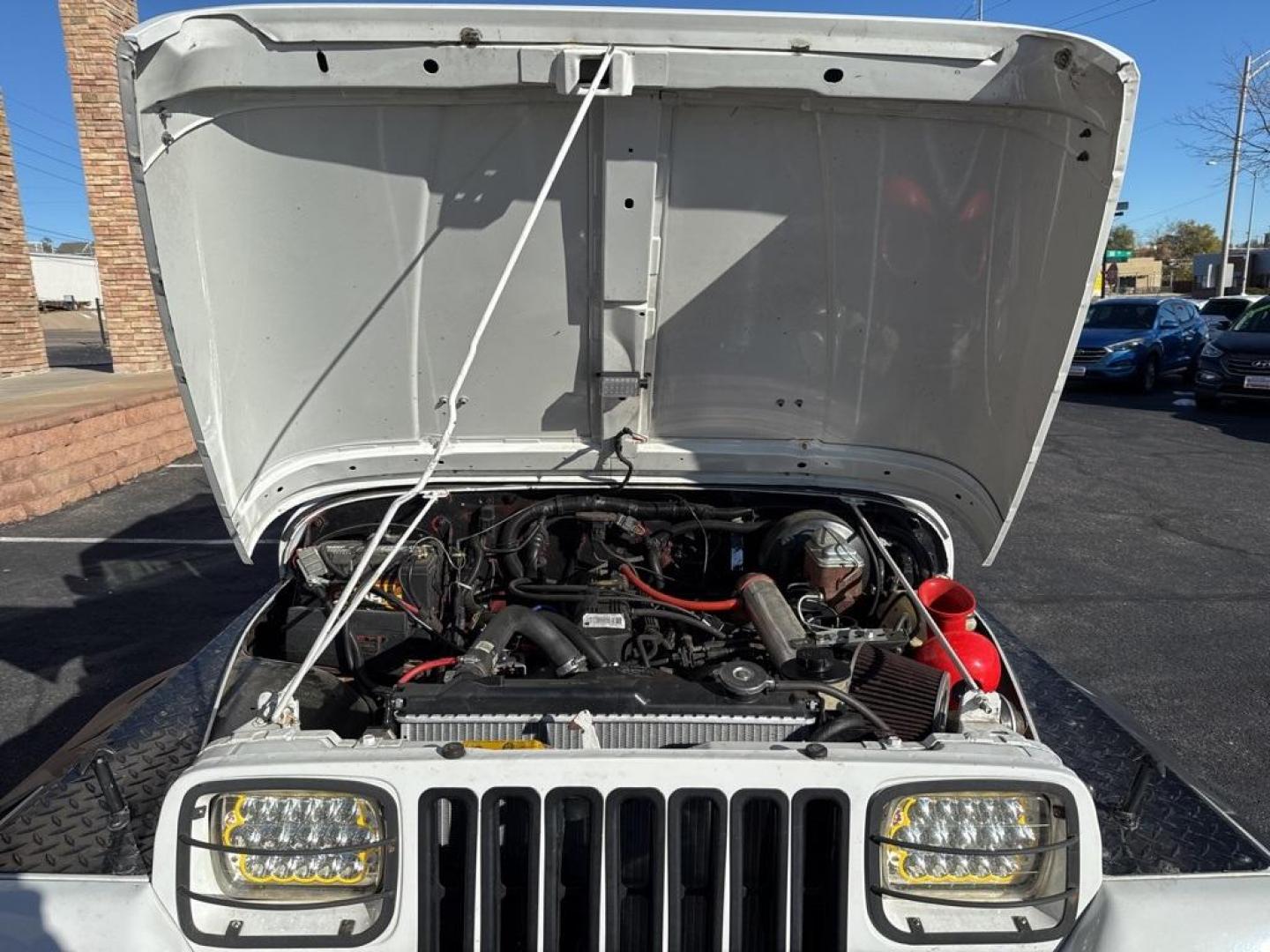 1994 White /Black Jeep Wrangler S (1J4FY19P2RP) with an 2.5L I4 8V engine, Automatic transmission, located at 8595 Washington St., Thornton, CO, 80229, (303) 287-5511, 39.852348, -104.978447 - 1994 Jeep Wrangler 4WD that someone spent a lot of time and money rebuilding so you dont need to! Rebuilt from the ground up and runs great. Lots of extras goodies and ready for any sort of adventure. <br><br>D1 Auto NEVER charges dealer fees! All cars have clean titles and have been inspected for m - Photo#35