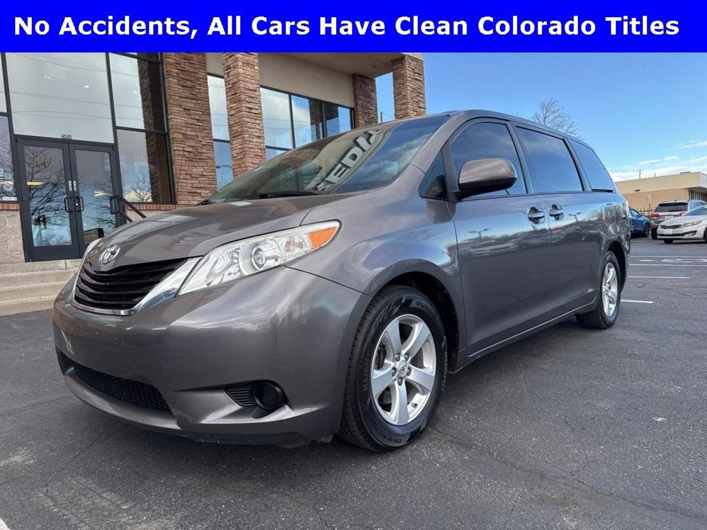 2014 Predawn Gray Mica /Light Gray Toyota Sienna LE (5TDKK3DCXES) with an 3.5L V6 SMPI DOHC engine, Automatic transmission, located at 8595 Washington St., Thornton, CO, 80229, (303) 287-5511, 39.852348, -104.978447 - 2014 Toyota Sienna FWD 8 Passenger<br><br>D1 Auto NEVER charges dealer fees! All cars have clean titles and have been inspected for mechanical issues. We have financing for everyone. Good credit, bad credit, first time buyers.<br>Clean CARFAX. Odometer is 24985 miles below market average!<br>Please - Photo#0