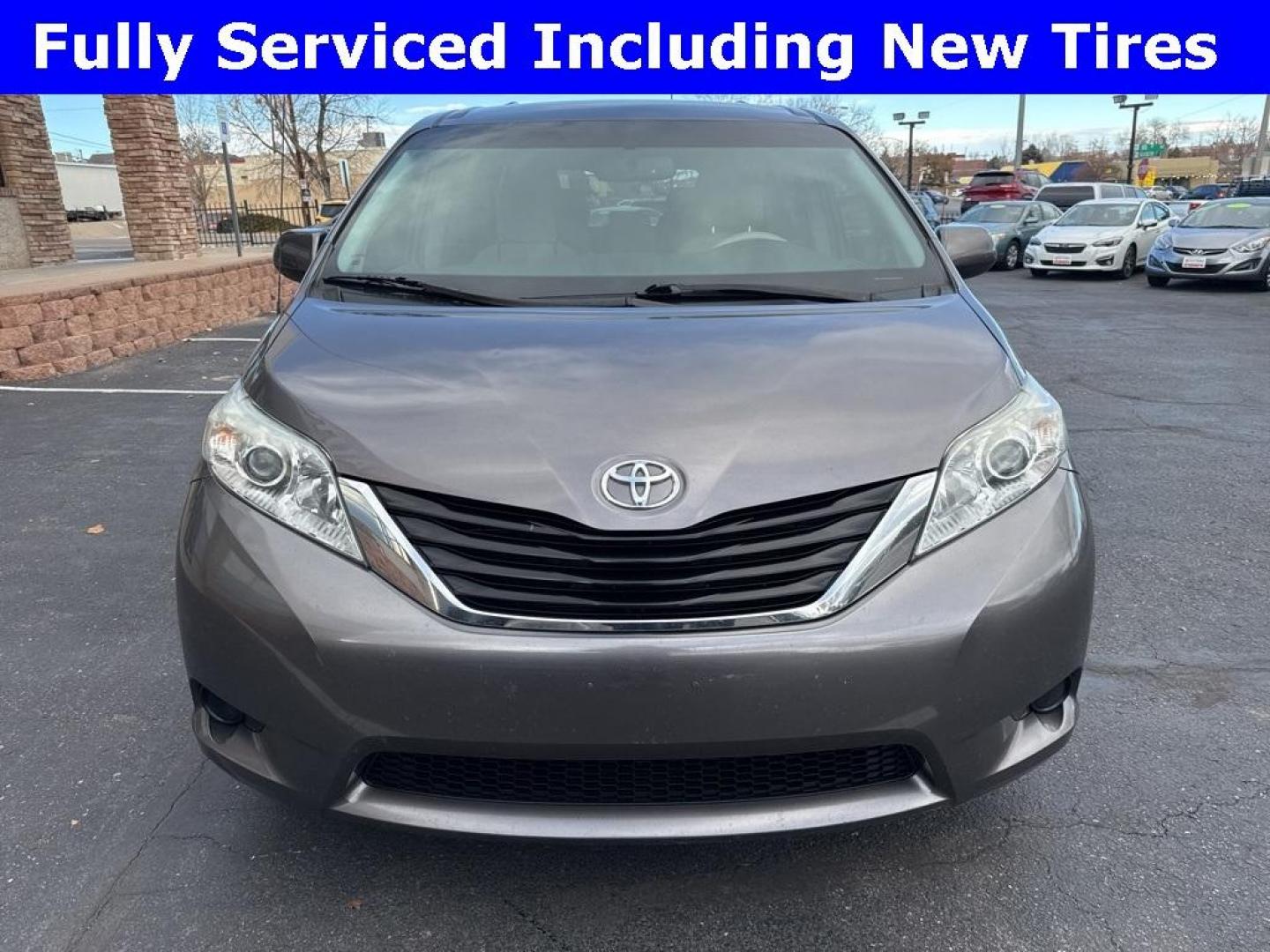 2014 Predawn Gray Mica /Light Gray Toyota Sienna LE (5TDKK3DCXES) with an 3.5L V6 SMPI DOHC engine, Automatic transmission, located at 8595 Washington St., Thornton, CO, 80229, (303) 287-5511, 39.852348, -104.978447 - 2014 Toyota Sienna FWD 8 Passenger<br><br>D1 Auto NEVER charges dealer fees! All cars have clean titles and have been inspected for mechanical issues. We have financing for everyone. Good credit, bad credit, first time buyers.<br>Clean CARFAX. Odometer is 24985 miles below market average!<br>Please - Photo#1