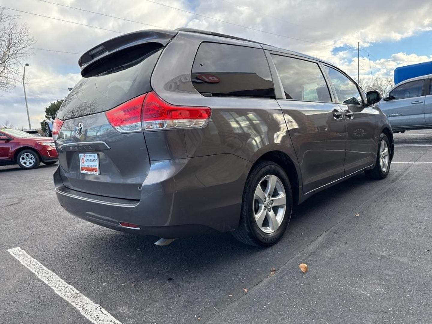 2014 Predawn Gray Mica /Light Gray Toyota Sienna LE (5TDKK3DCXES) with an 3.5L V6 SMPI DOHC engine, Automatic transmission, located at 8595 Washington St., Thornton, CO, 80229, (303) 287-5511, 39.852348, -104.978447 - 2014 Toyota Sienna FWD 8 Passenger<br><br>D1 Auto NEVER charges dealer fees! All cars have clean titles and have been inspected for mechanical issues. We have financing for everyone. Good credit, bad credit, first time buyers.<br>Clean CARFAX. Odometer is 24985 miles below market average!<br>Please - Photo#5