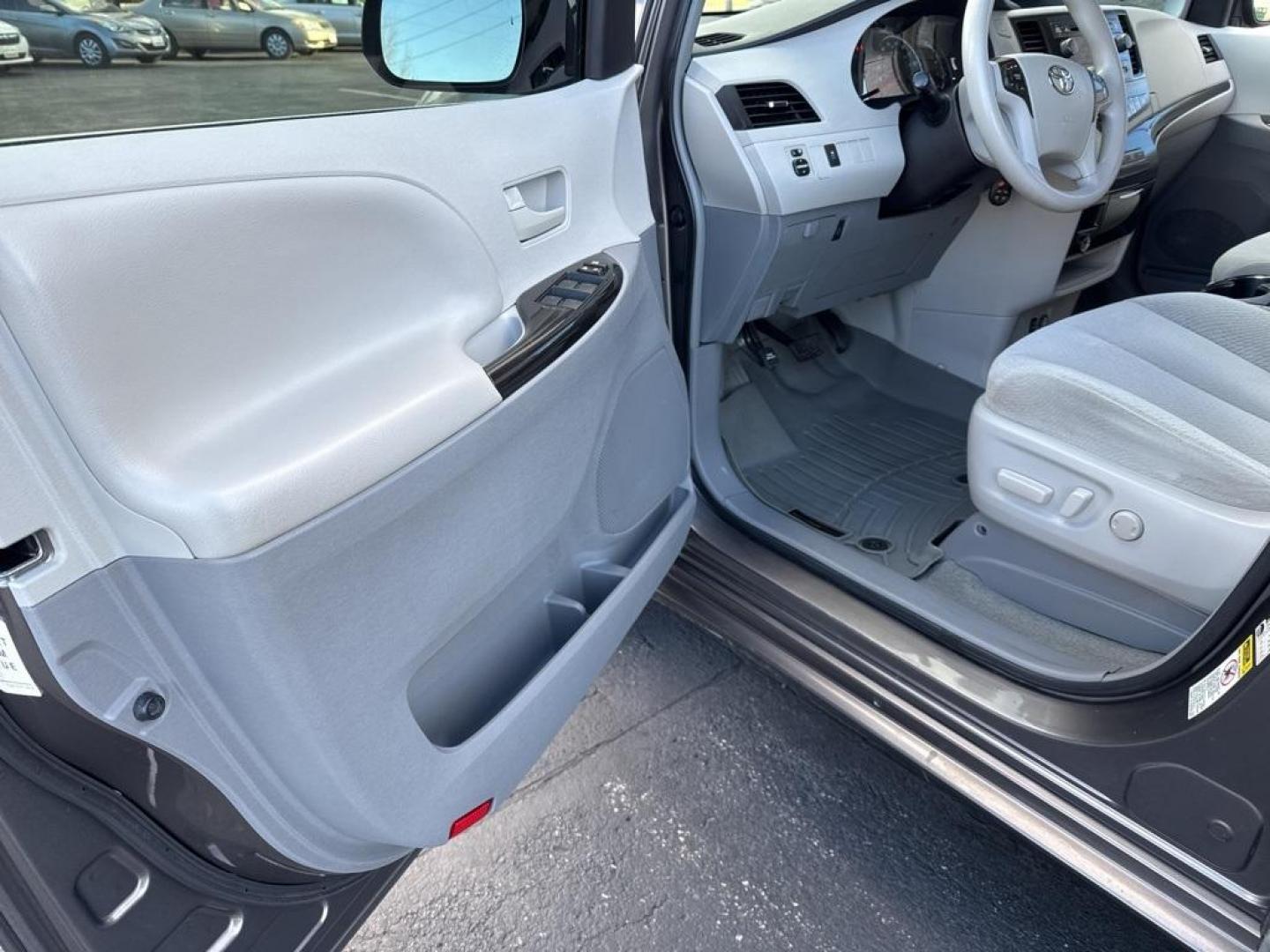 2014 Predawn Gray Mica /Light Gray Toyota Sienna LE (5TDKK3DCXES) with an 3.5L V6 SMPI DOHC engine, Automatic transmission, located at 8595 Washington St., Thornton, CO, 80229, (303) 287-5511, 39.852348, -104.978447 - 2014 Toyota Sienna FWD 8 Passenger<br><br>D1 Auto NEVER charges dealer fees! All cars have clean titles and have been inspected for mechanical issues. We have financing for everyone. Good credit, bad credit, first time buyers.<br>Clean CARFAX. Odometer is 24985 miles below market average!<br>Please - Photo#32