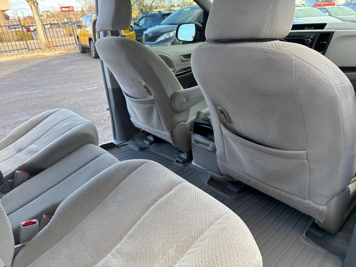 2014 Predawn Gray Mica /Light Gray Toyota Sienna LE (5TDKK3DCXES) with an 3.5L V6 SMPI DOHC engine, Automatic transmission, located at 8595 Washington St., Thornton, CO, 80229, (303) 287-5511, 39.852348, -104.978447 - 2014 Toyota Sienna FWD 8 Passenger<br><br>D1 Auto NEVER charges dealer fees! All cars have clean titles and have been inspected for mechanical issues. We have financing for everyone. Good credit, bad credit, first time buyers.<br>Clean CARFAX. Odometer is 24985 miles below market average!<br>Please - Photo#33