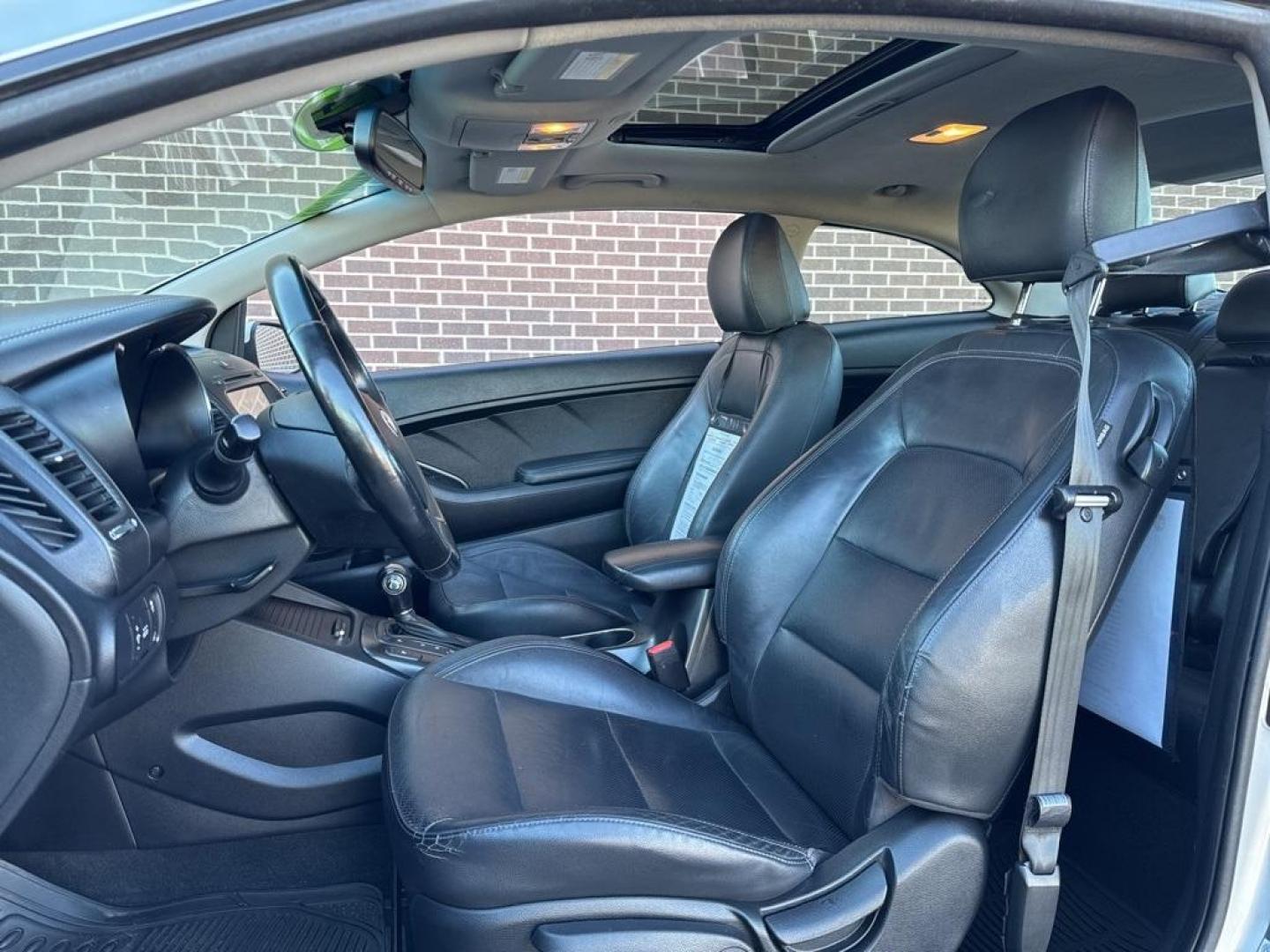 2014 Bright Silver /Black Kia Forte Koup EX (KNAFX6A8XE5) with an 2.0L I4 DOHC CVVT engine, Automatic transmission, located at 8595 Washington St., Thornton, CO, 80229, (303) 287-5511, 39.852348, -104.978447 - 2014 Kia Forte Koup FWD<br><br>D1 Auto NEVER charges dealer fees! All cars have clean titles and have been inspected for mechanical issues. We have financing for everyone. Good credit, bad credit, first time buyers.<br><br>Please call Lakewood Location 303-274-7692 or Thornton 303-287-5511 to schedu - Photo#14